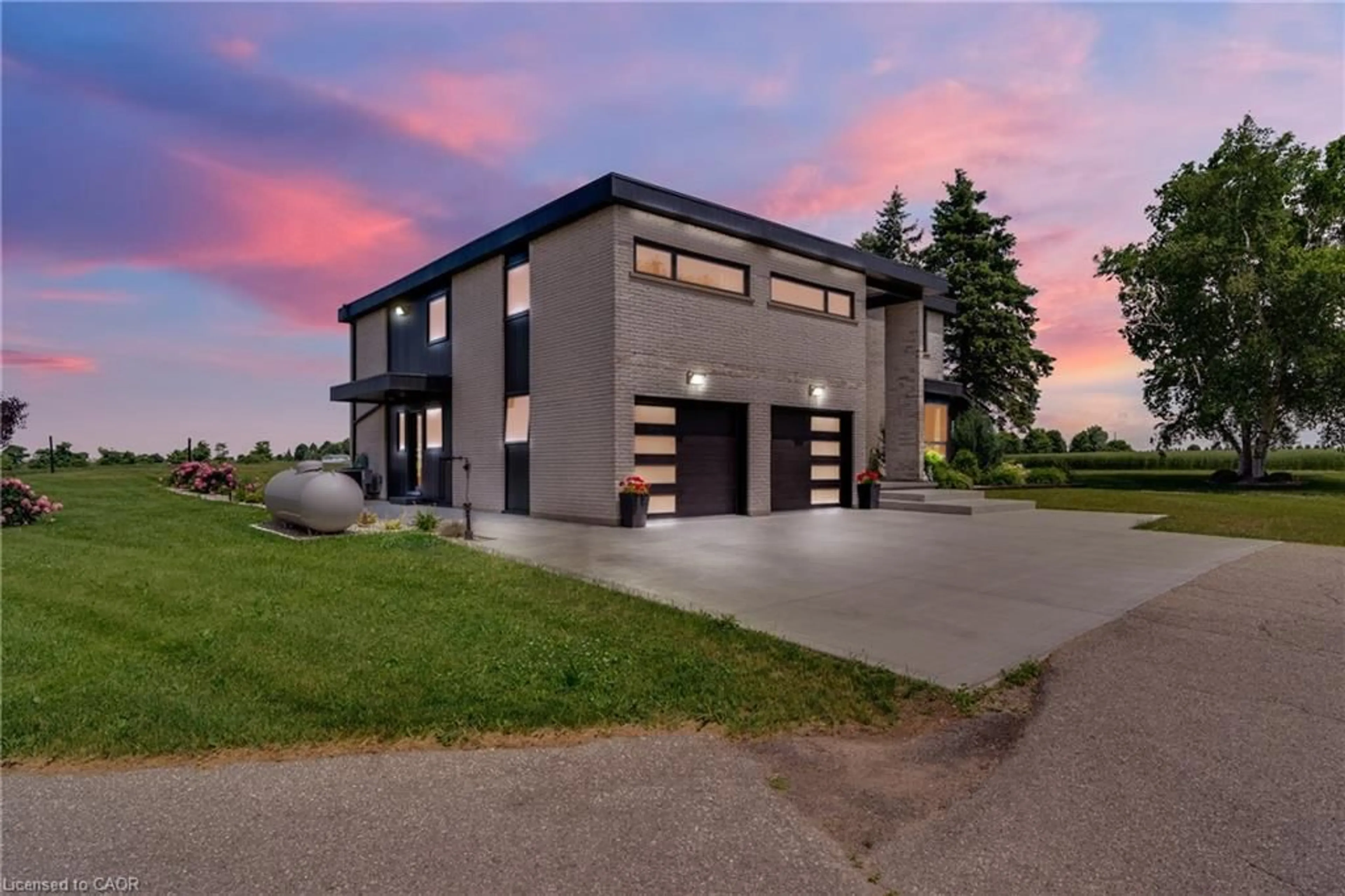 Home with brick exterior material, street for 8312 Wellington Road 124, Guelph Ontario N1H 6H7