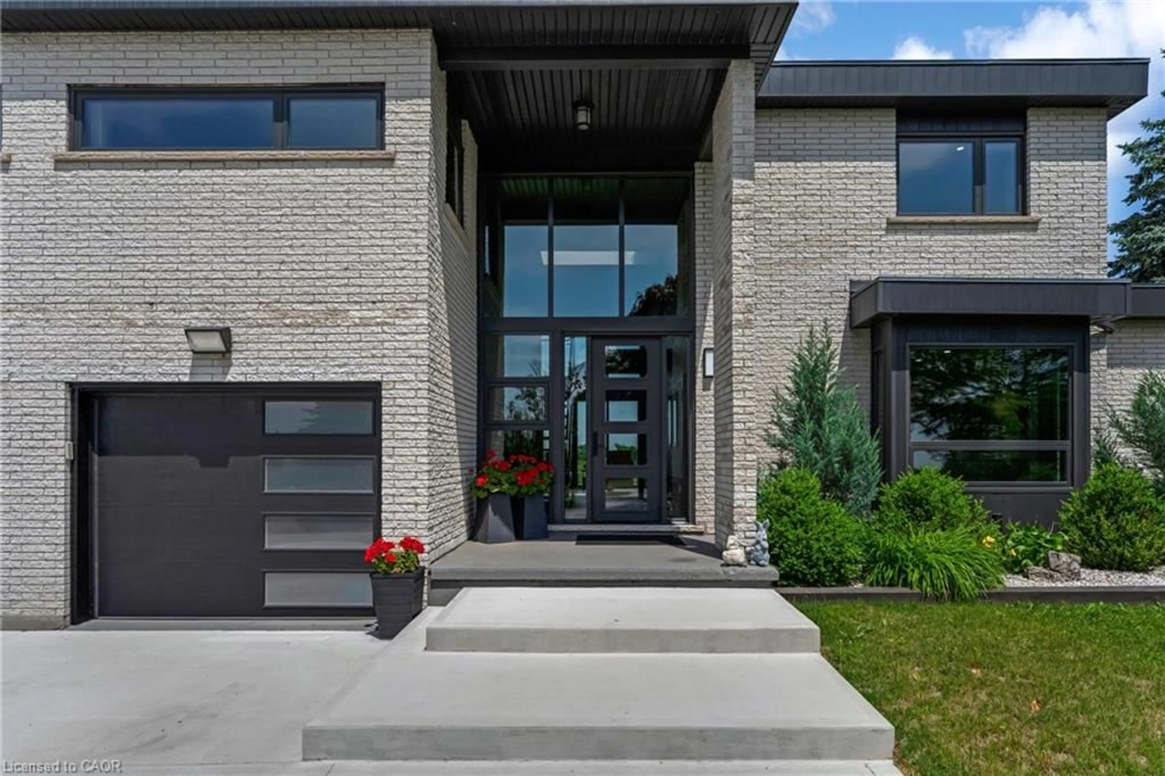 Home with brick exterior material, street for 8312 Wellington Road 124, Guelph Ontario N1H 6H7