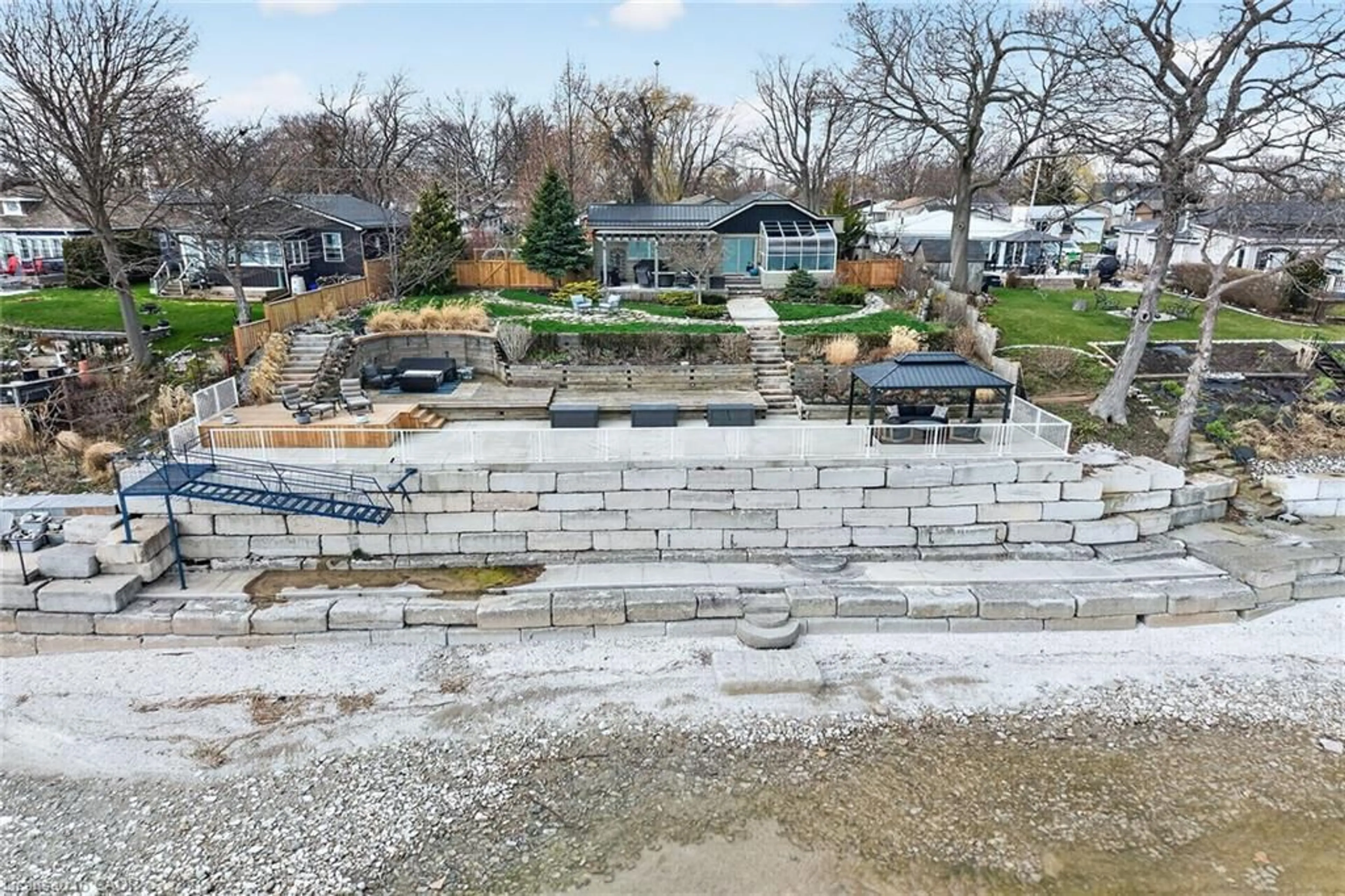 A pic from outside/outdoor area/front of a property/back of a property/a pic from drone, water/lake/river/ocean view for 108 Lakeside Dr, Nanticoke Ontario N0A 1L0