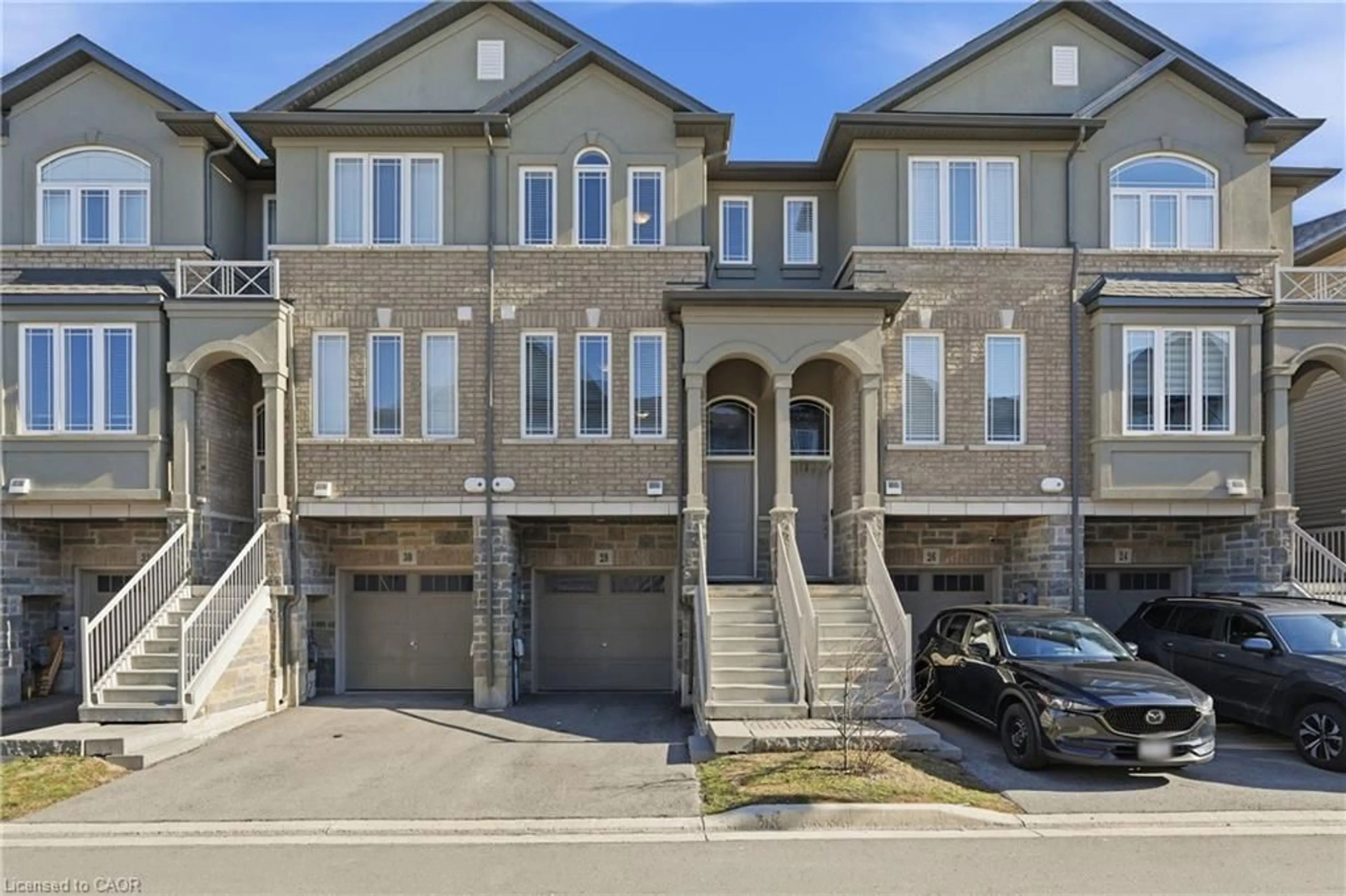 A pic from outside/outdoor area/front of a property/back of a property/a pic from drone, street for 28 Aqua Lane, Glanbrook Ontario L0R 1P0