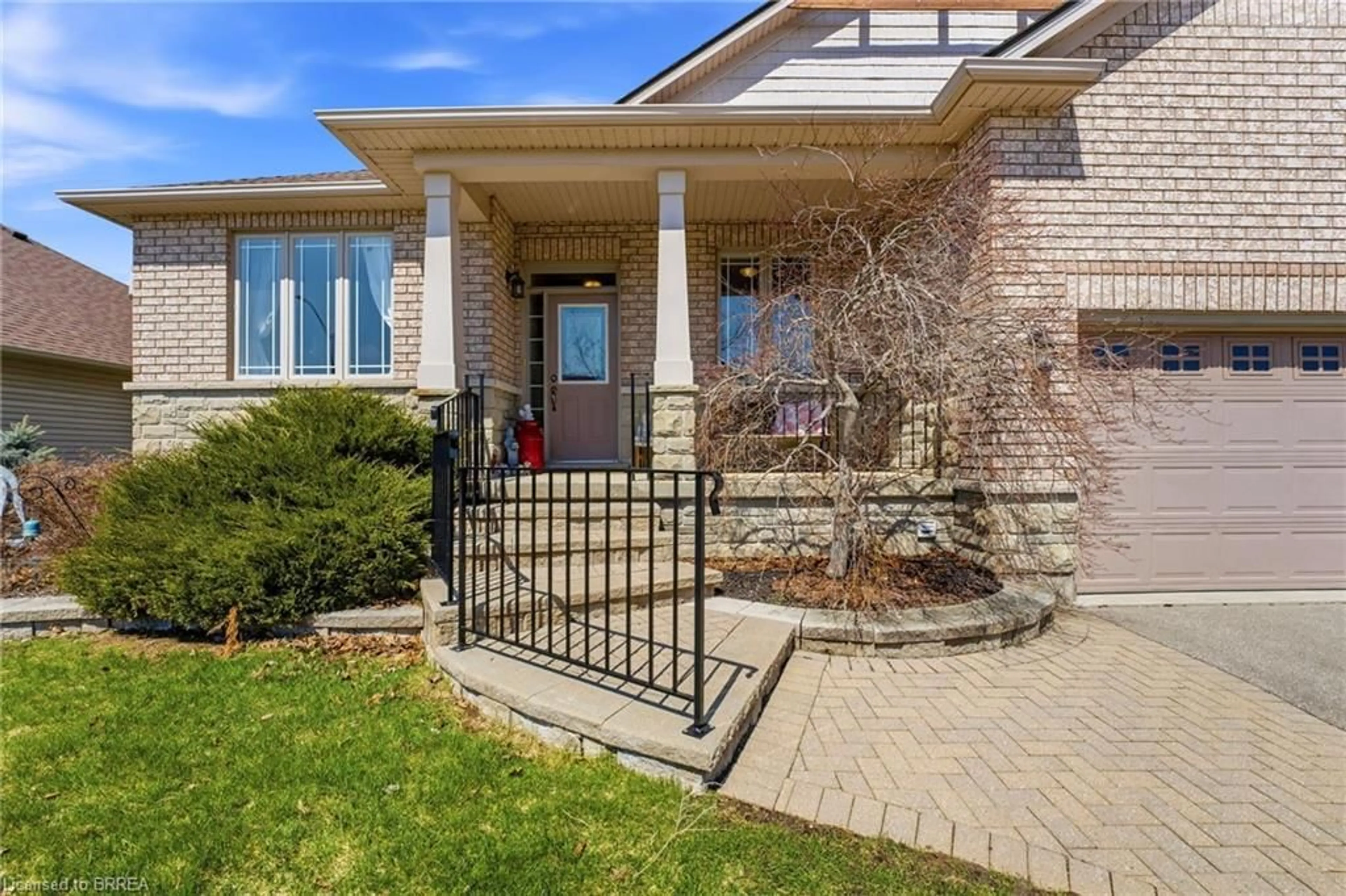 Home with brick exterior material, street for 26 Cobblestone Dr, Paris Ontario N3L 4G1