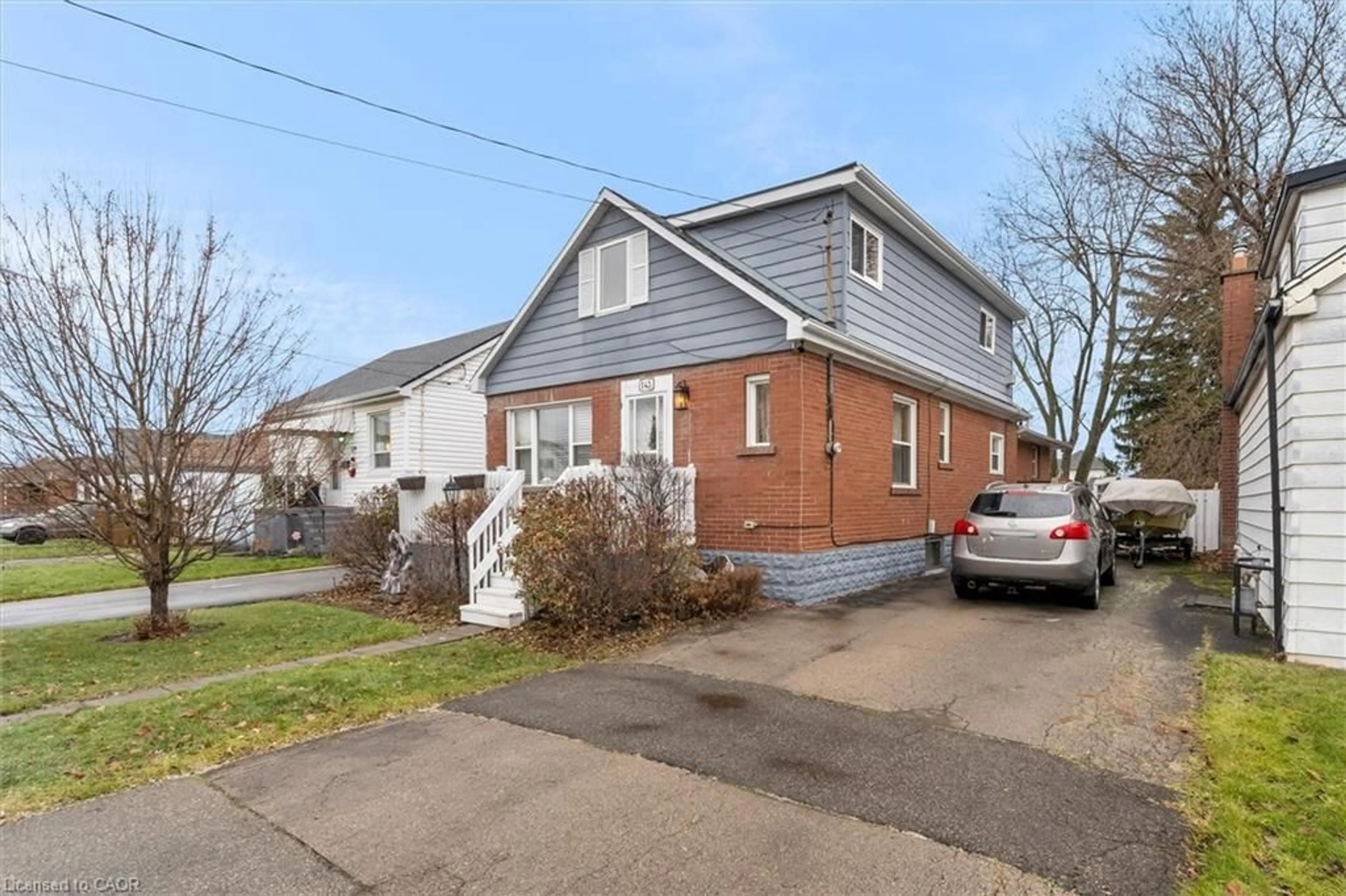Home with brick exterior material, street for 143 Walter Ave, Hamilton Ontario L8K 3K8