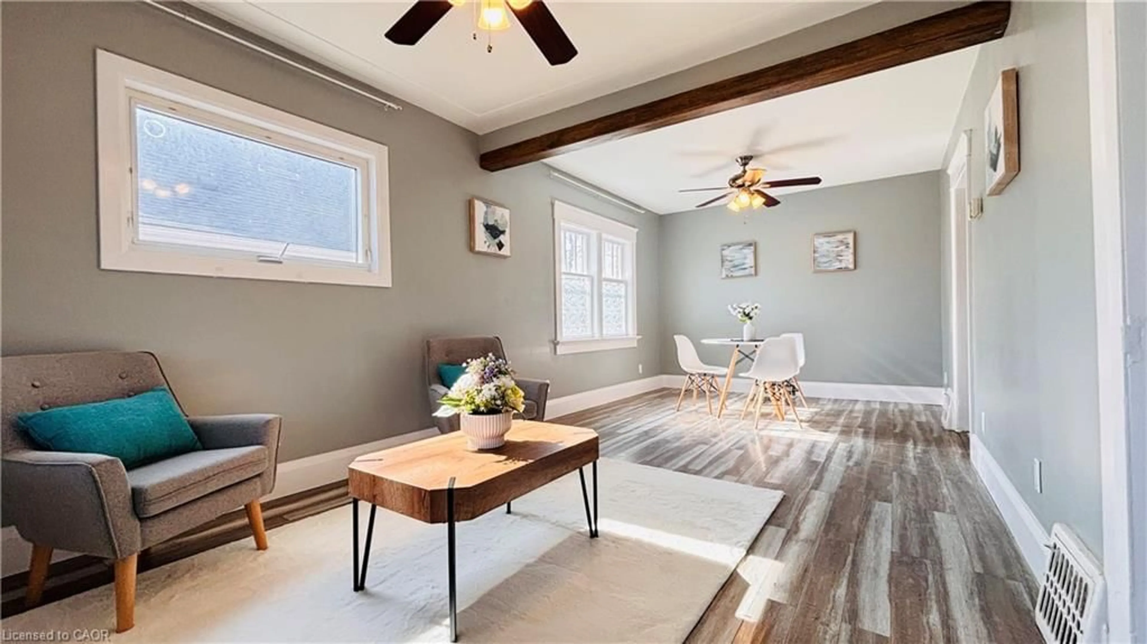 Living room with furniture, wood/laminate floor for 138 Glasgow St, Kitchener Ontario N2G 2G9