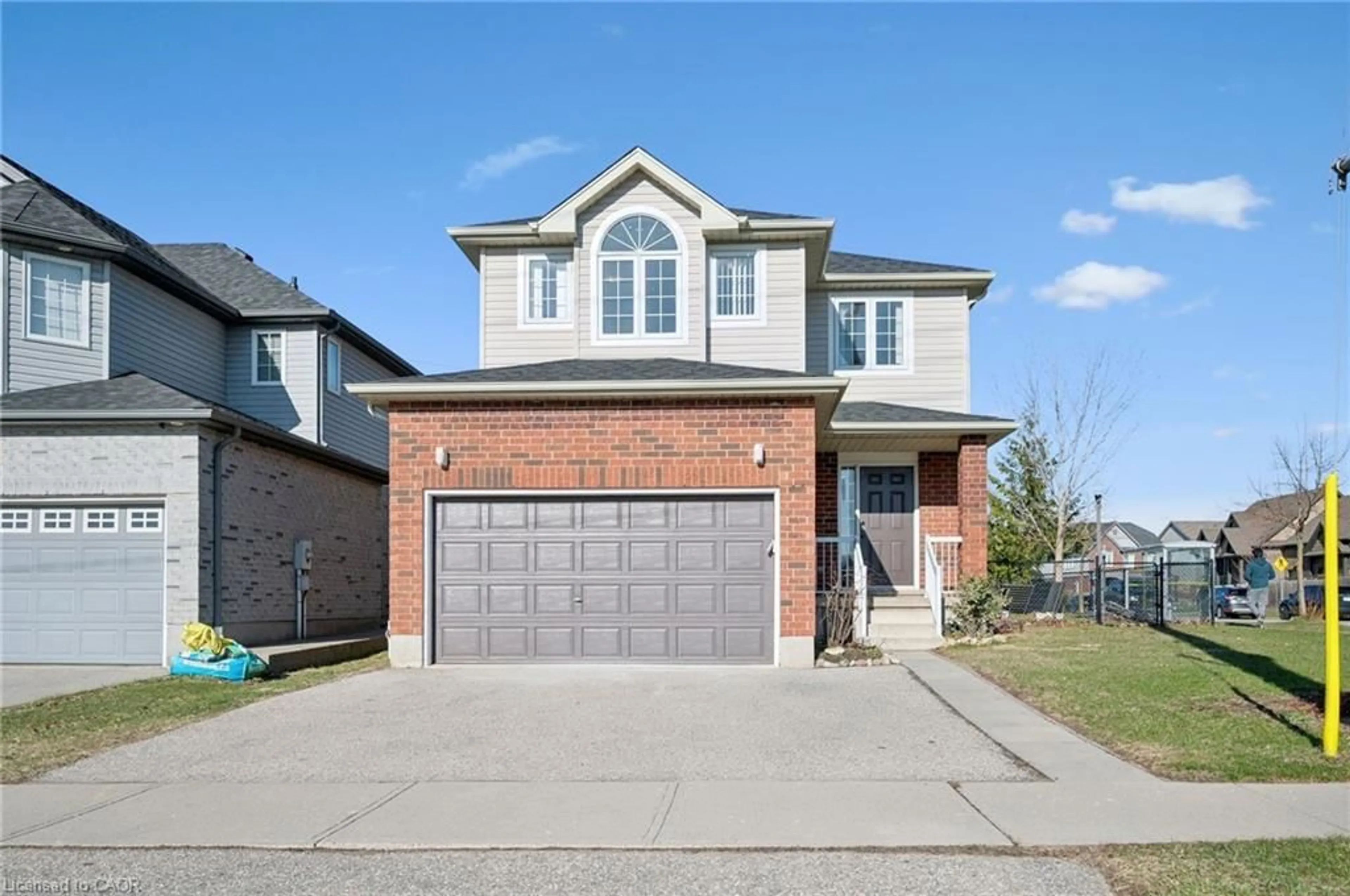 Home with brick exterior material, street for 649 Doon South Dr, Kitchener Ontario N2P 2X5