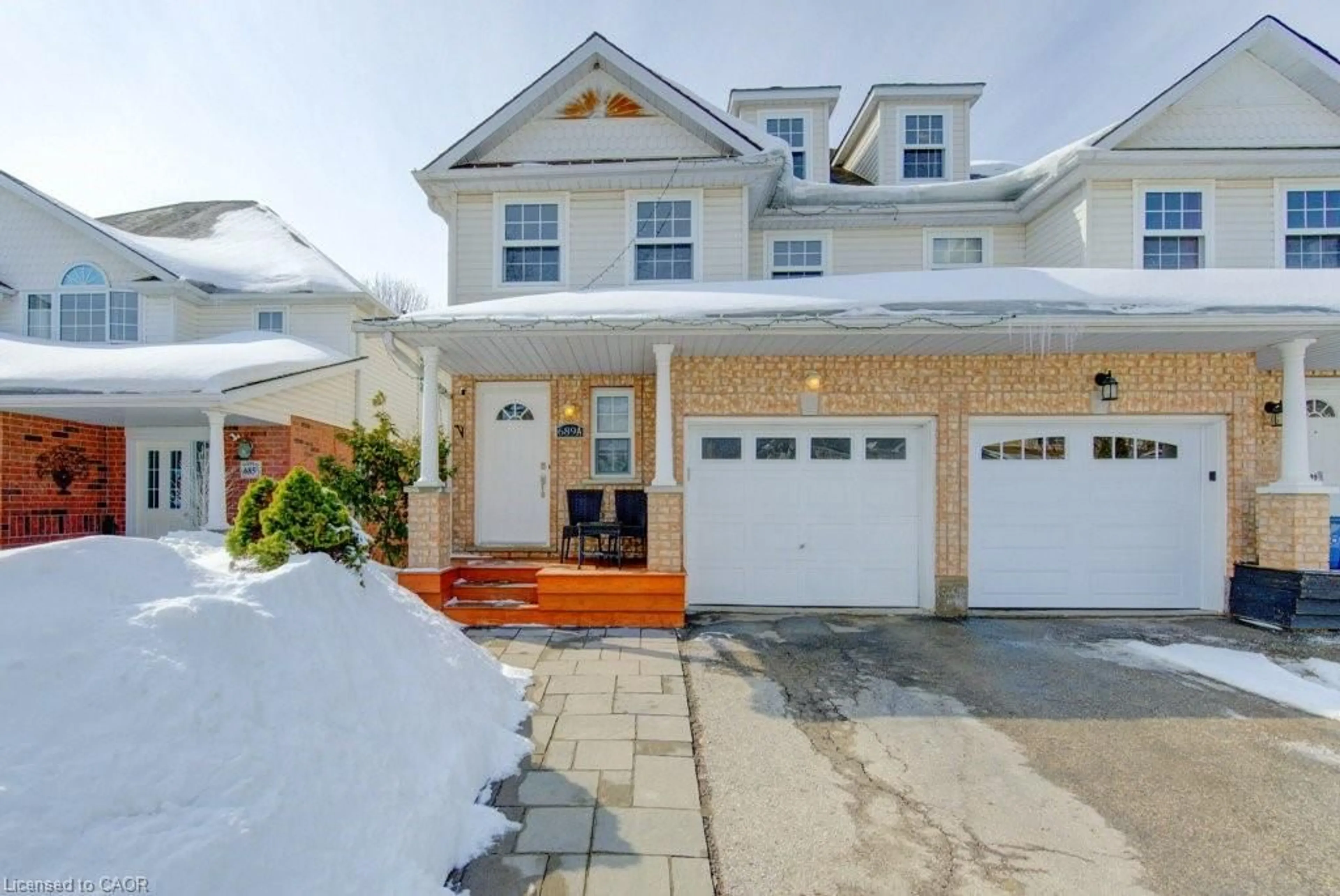 Home with vinyl exterior material, street for 689 Star Flower Ave #A, Waterloo Ontario N2V 2L2