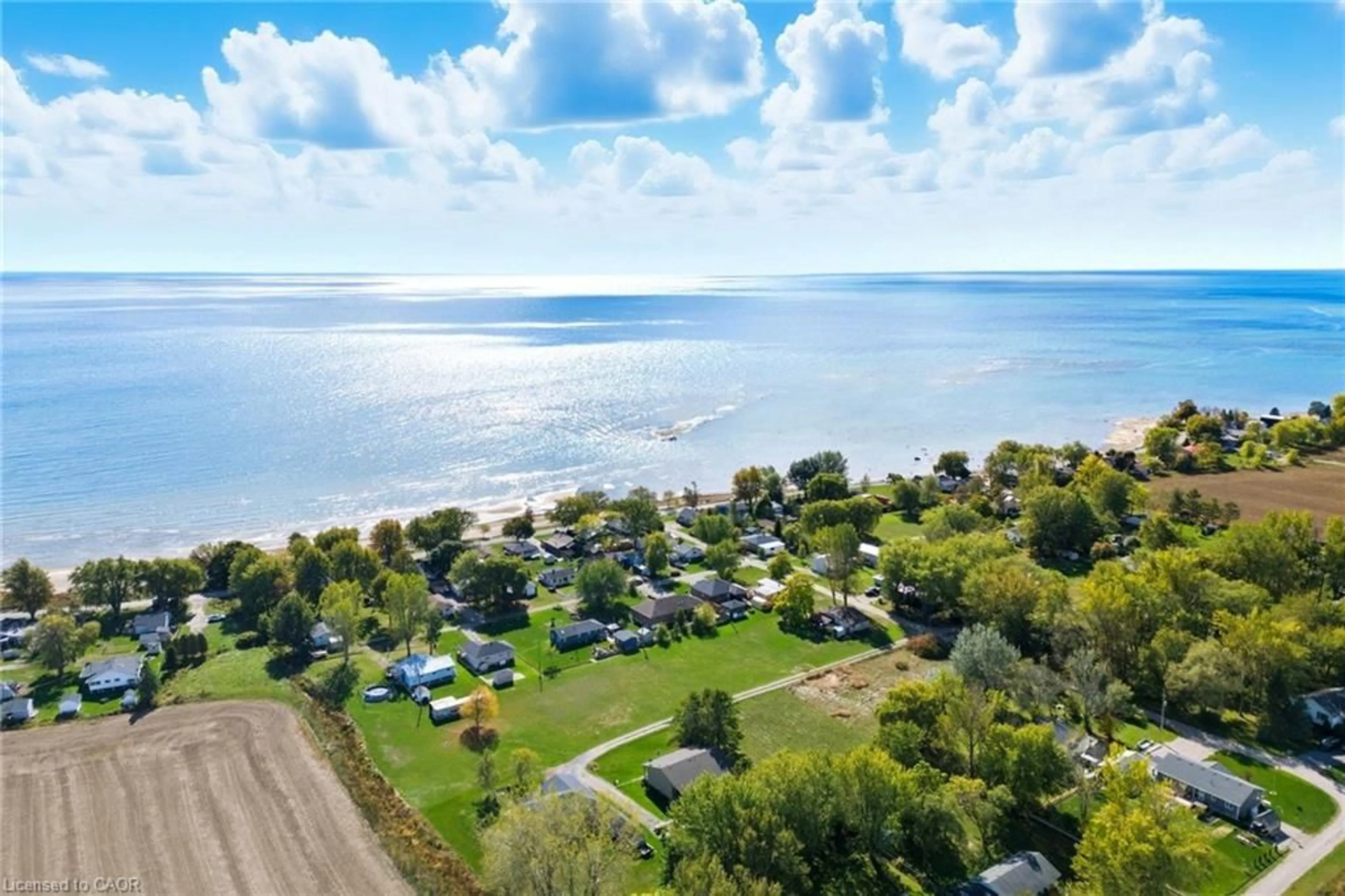 A pic from outside/outdoor area/front of a property/back of a property/a pic from drone, water/lake/river/ocean view for 29 Lakeview Lane, Selkirk Ontario N0A 1P0