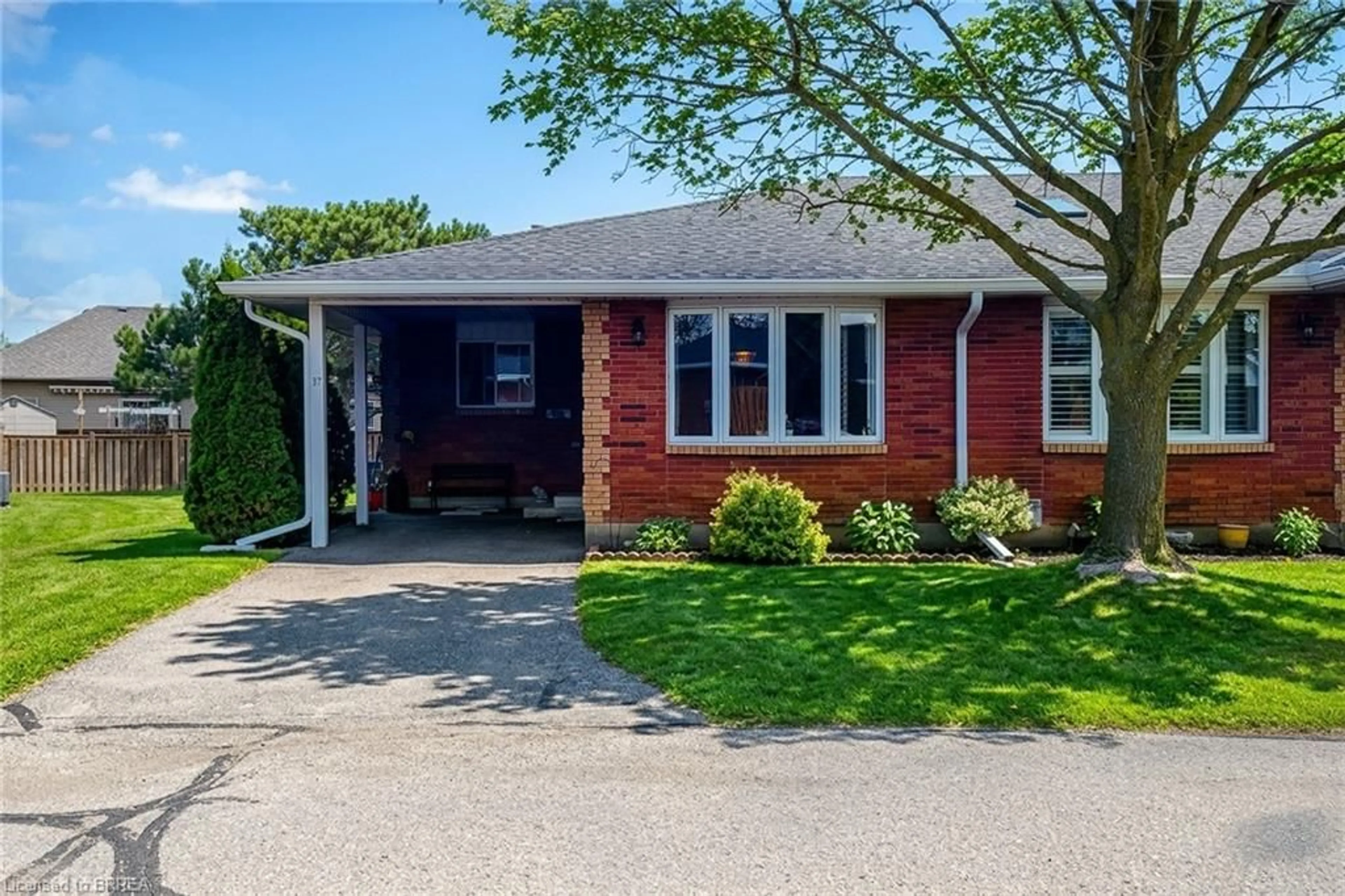 Home with brick exterior material, street for 1030 Colborne St #37, Brantford Ontario N38 3T6