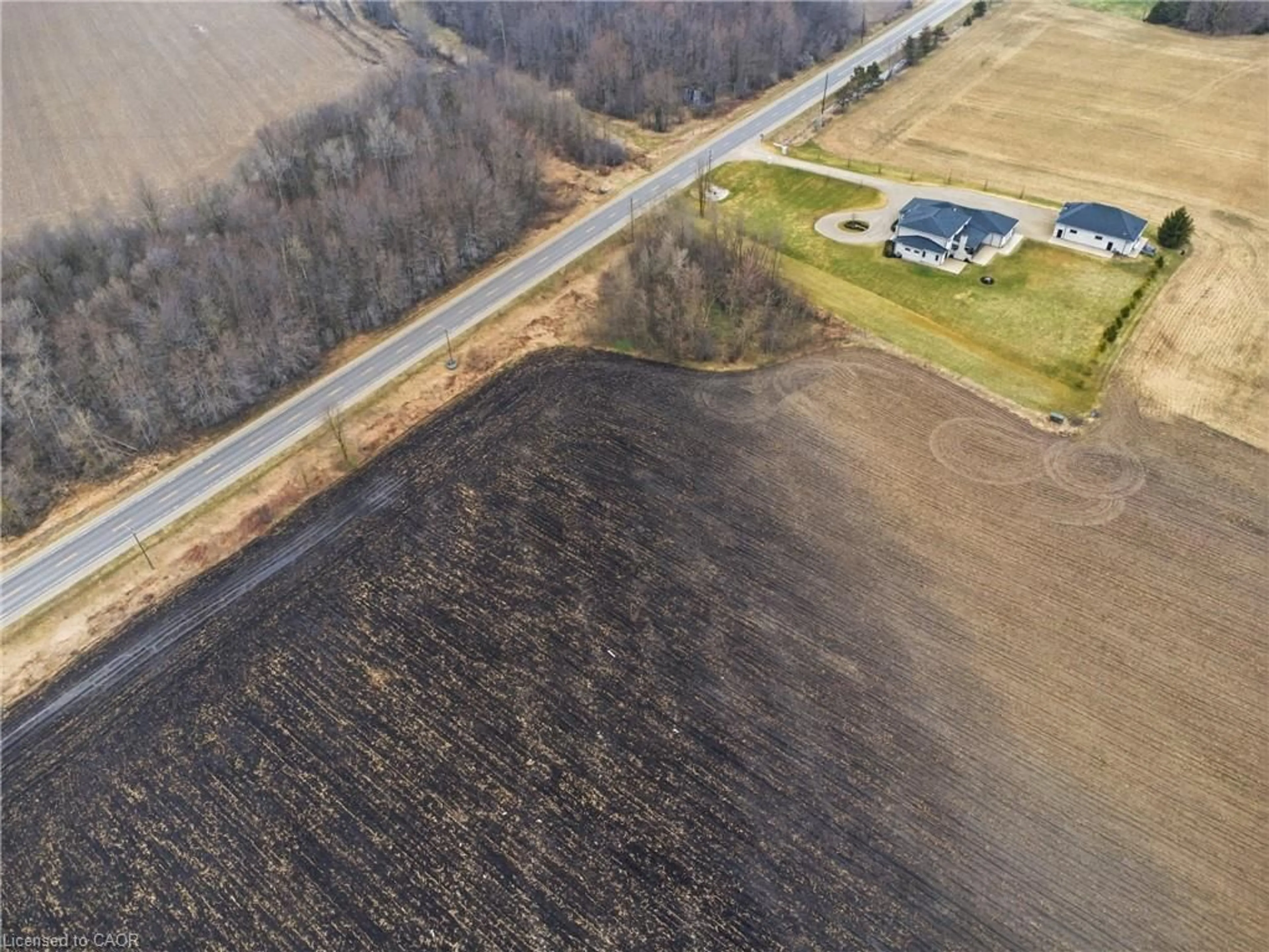 A pic from outside/outdoor area/front of a property/back of a property/a pic from drone, building for - Wellington Road 9, Mapleton Ontario N0G 2T0