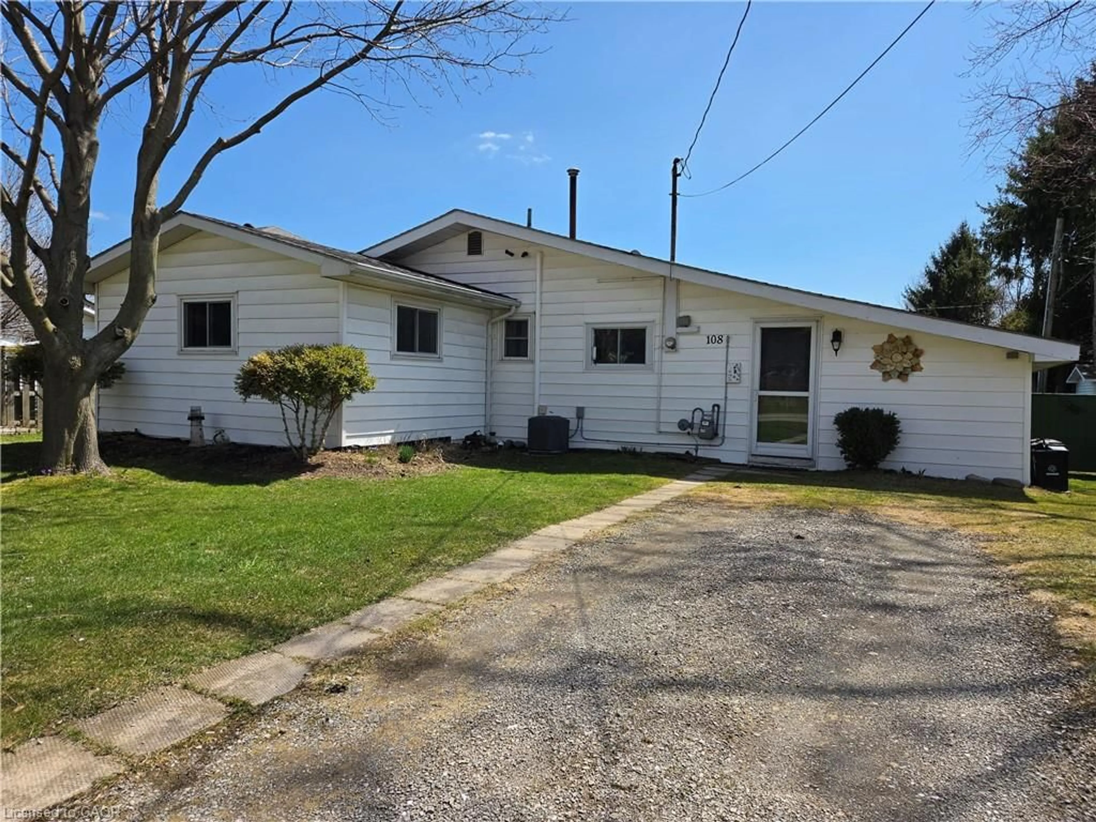 Home with vinyl exterior material, street for 108 New Lakeshore Rd, Port Dover Ontario N0A 1N8