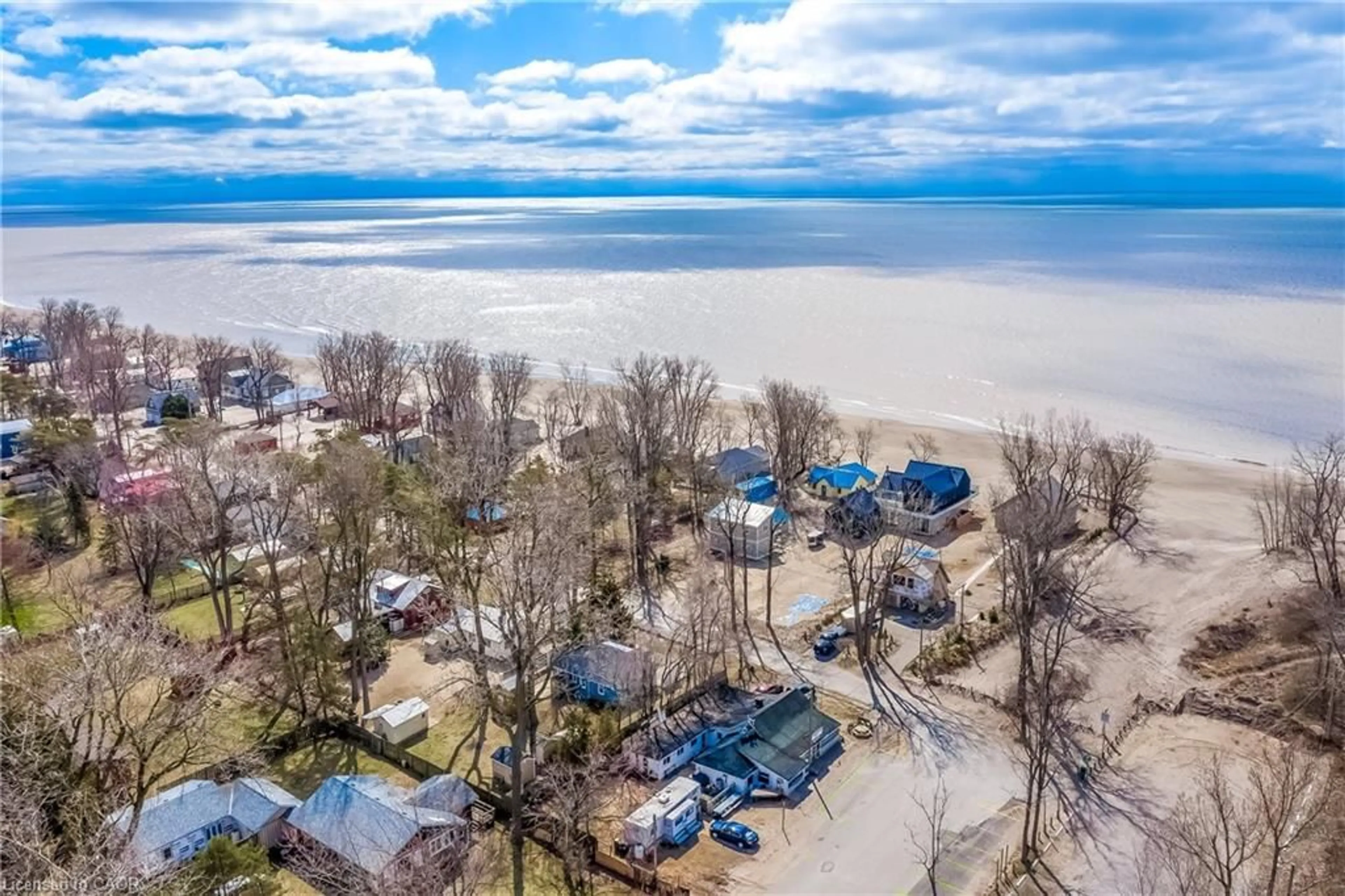A pic from outside/outdoor area/front of a property/back of a property/a pic from drone, water/lake/river/ocean view for 2 Beach Ave, Port Rowan Ontario N0E 1M0