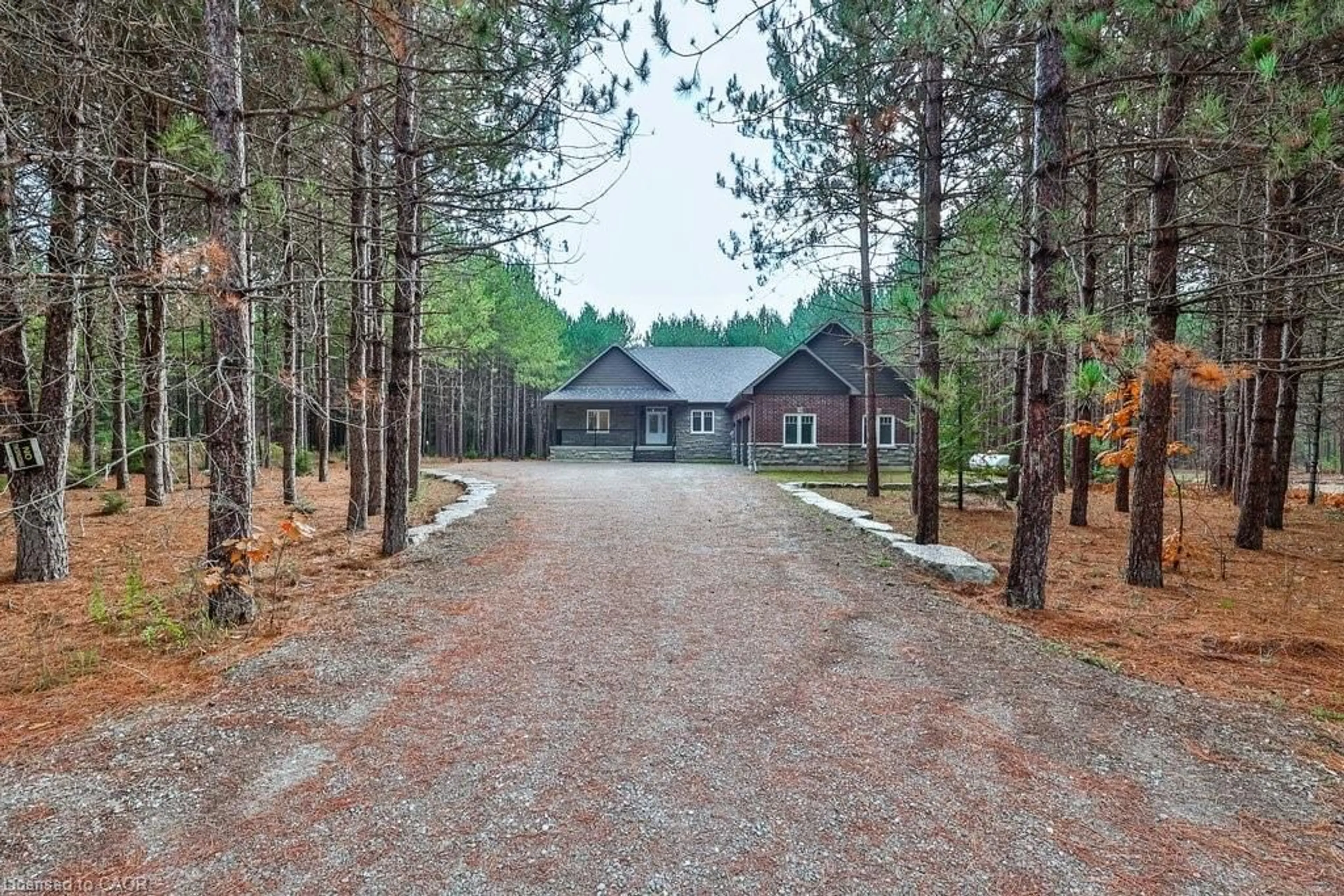 A pic from outside/outdoor area/front of a property/back of a property/a pic from drone, forest/trees view for 72 Harmonious Dr, Fenelon Falls Ontario K0M 1N0