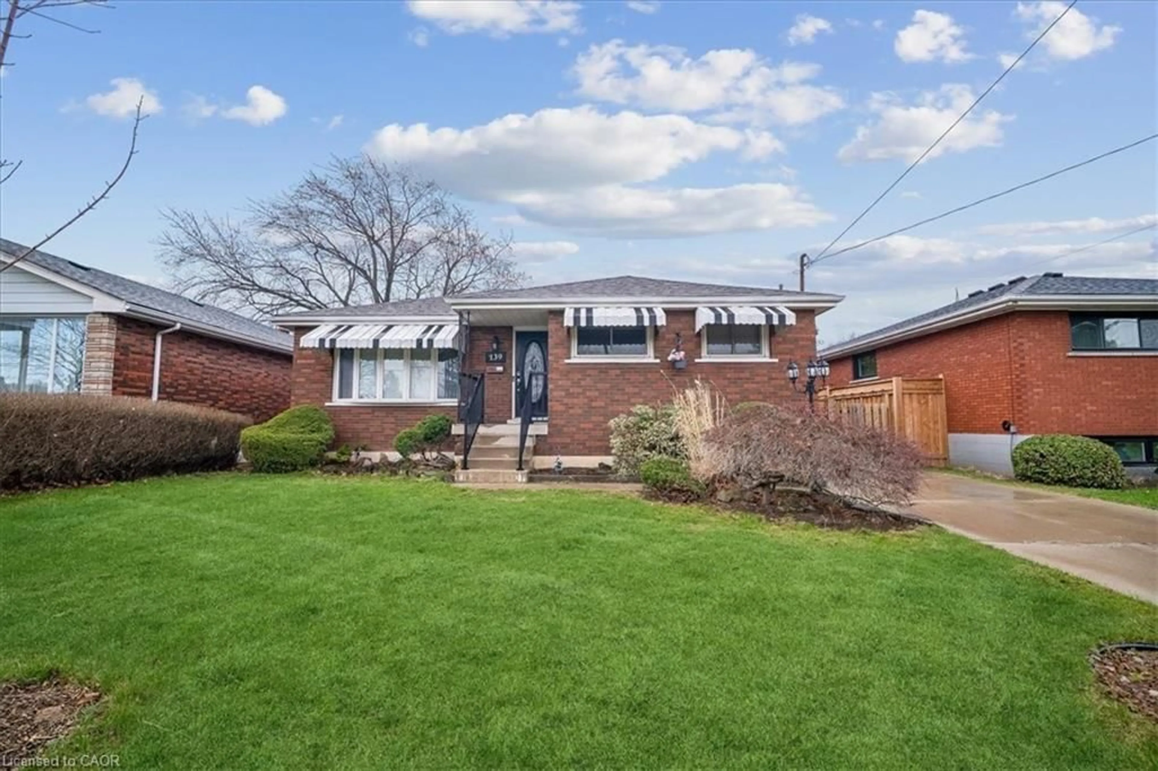 Home with brick exterior material, street for 139 Rendell Blvd, Hamilton Ontario L8T 3P7