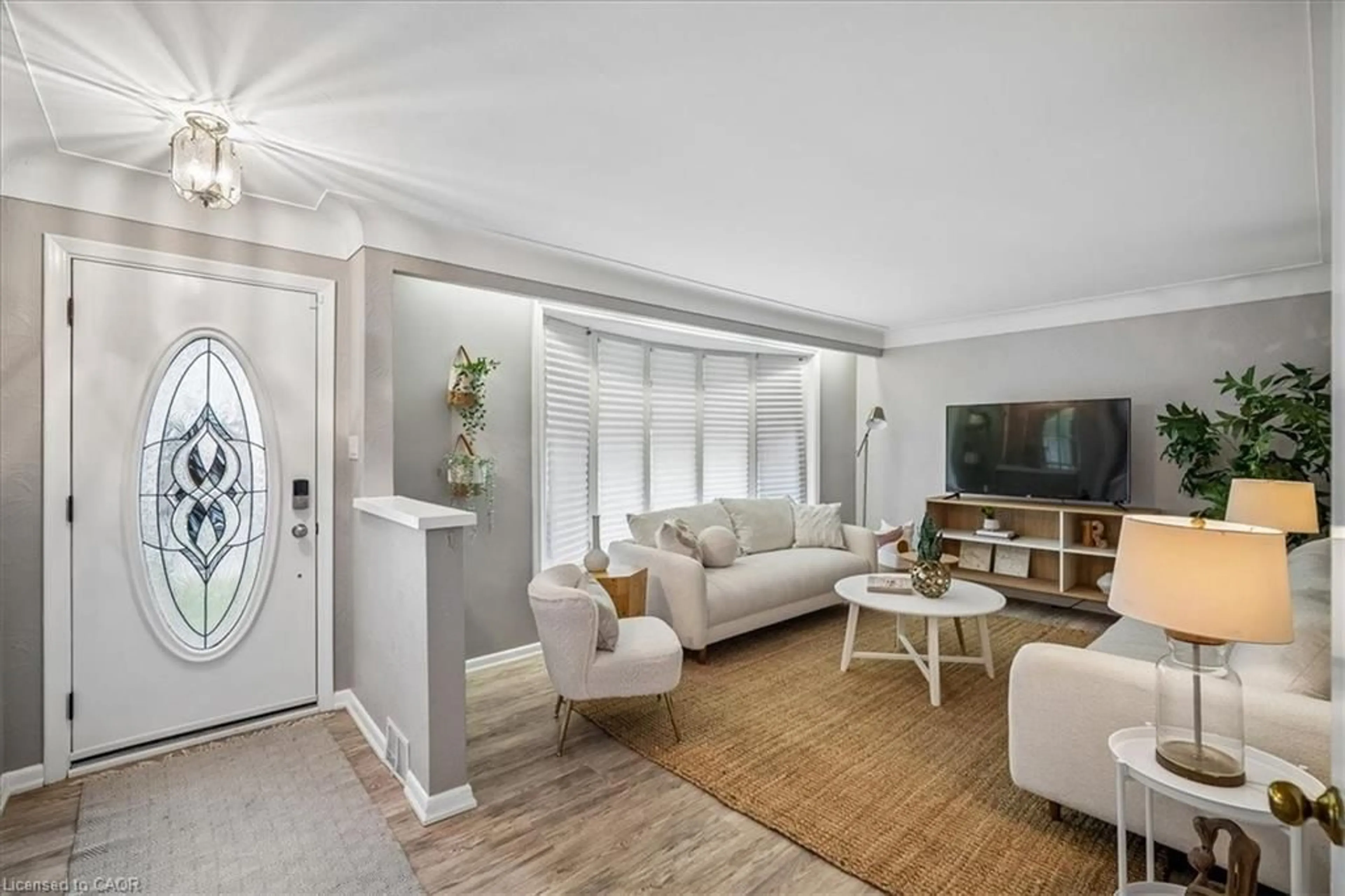 Living room with furniture, unknown for 139 Rendell Blvd, Hamilton Ontario L8T 3P7