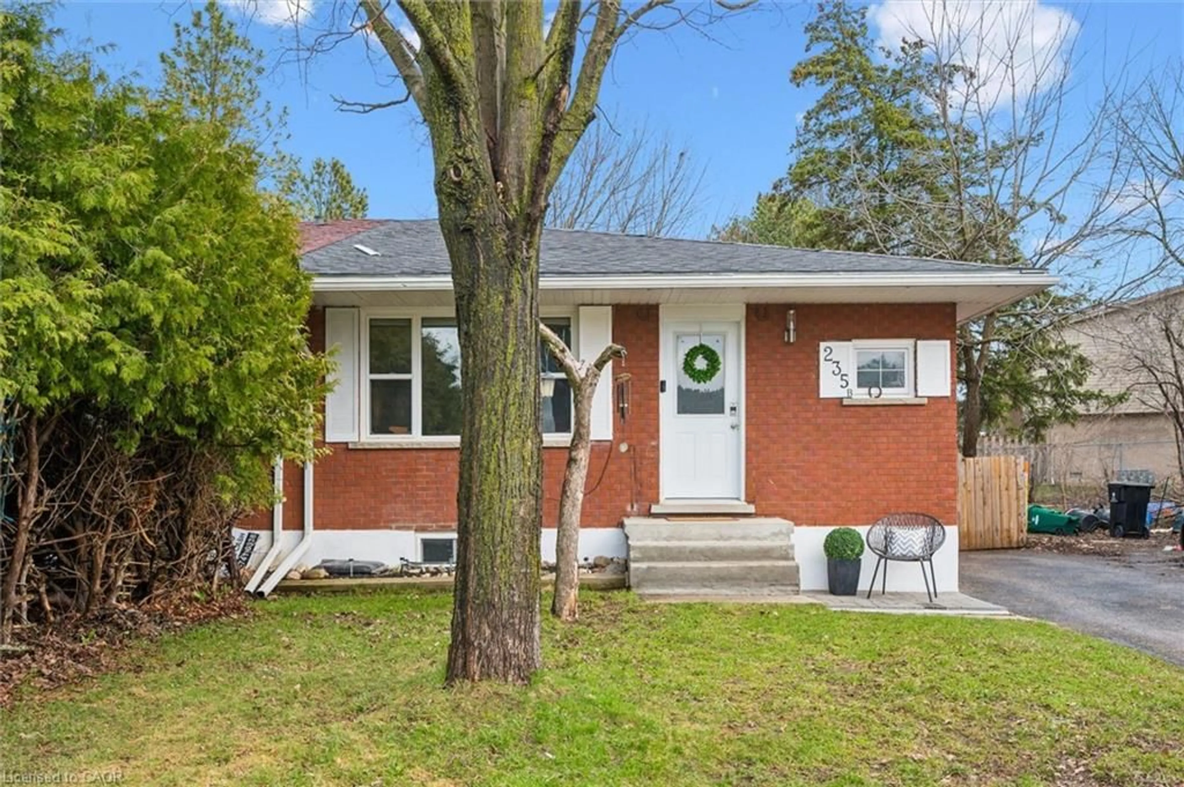 Home with brick exterior material, street for 235 Cedarbrae Ave #B, Waterloo Ontario N2L 4S8