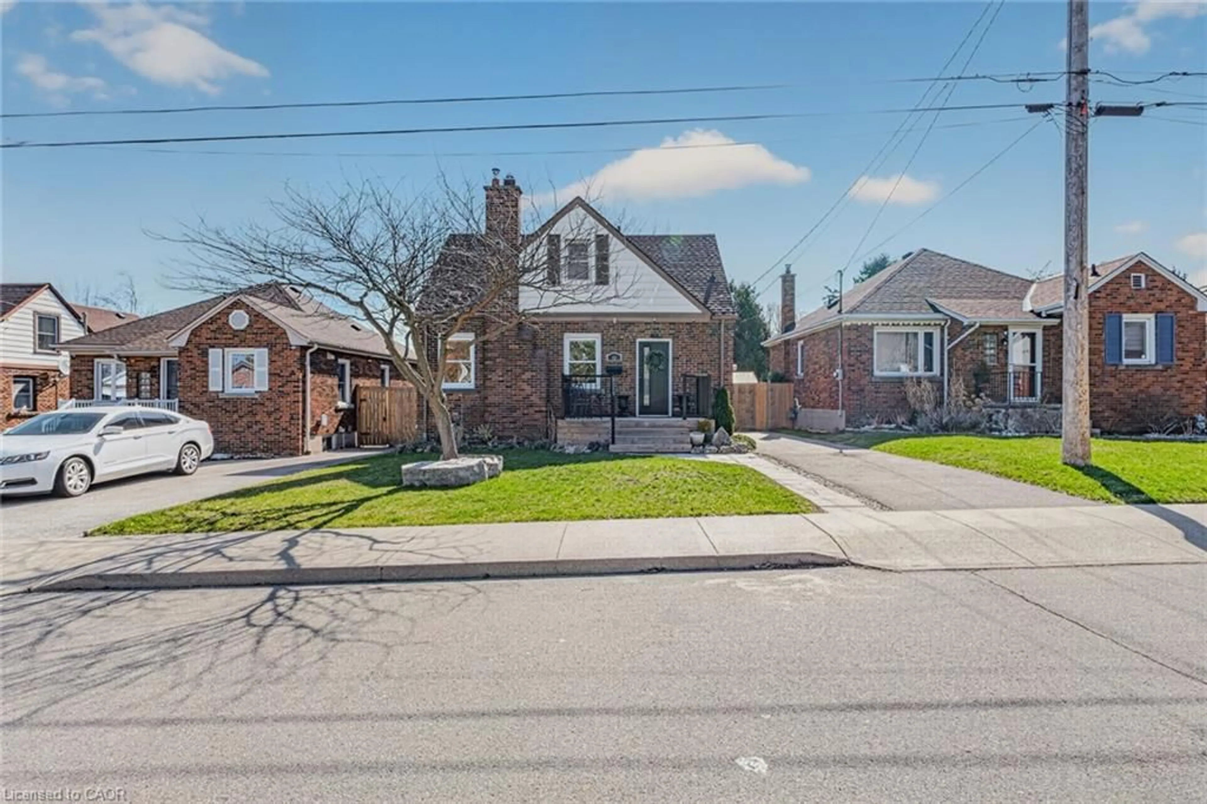 Home with brick exterior material, street for 43 Woodbridge Rd, Hamilton Ontario L8K 3C8
