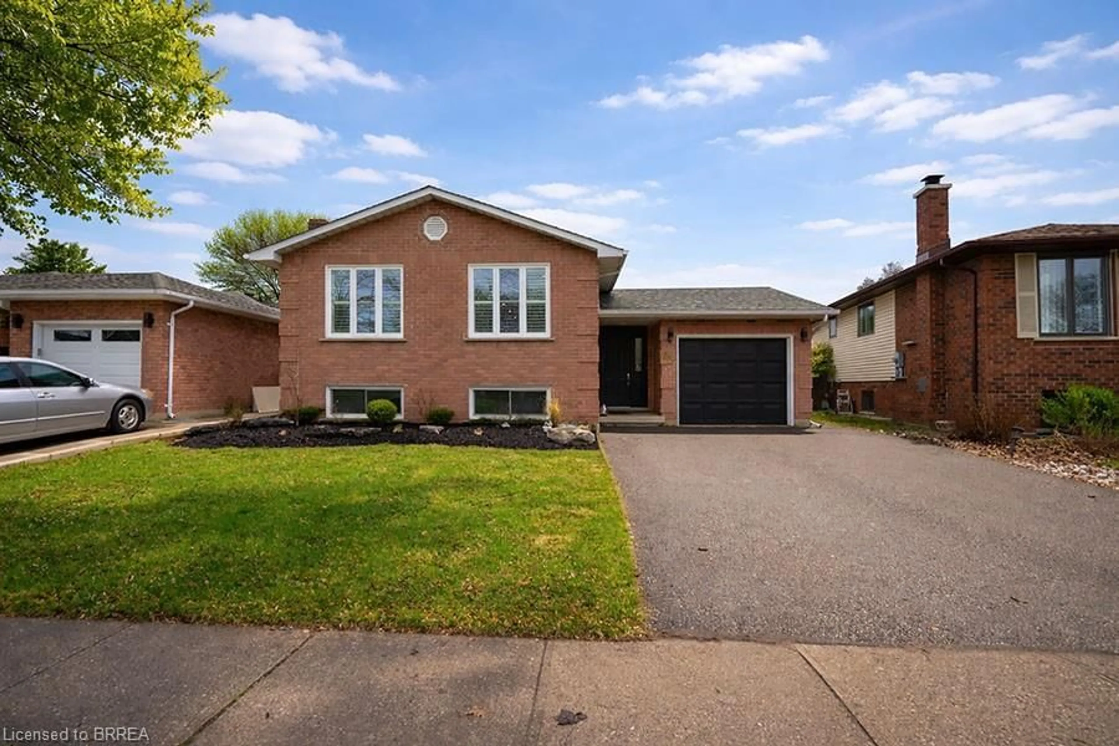 Home with brick exterior material, street for 73 Gillin Rd, Brantford Ontario N3P 1X2