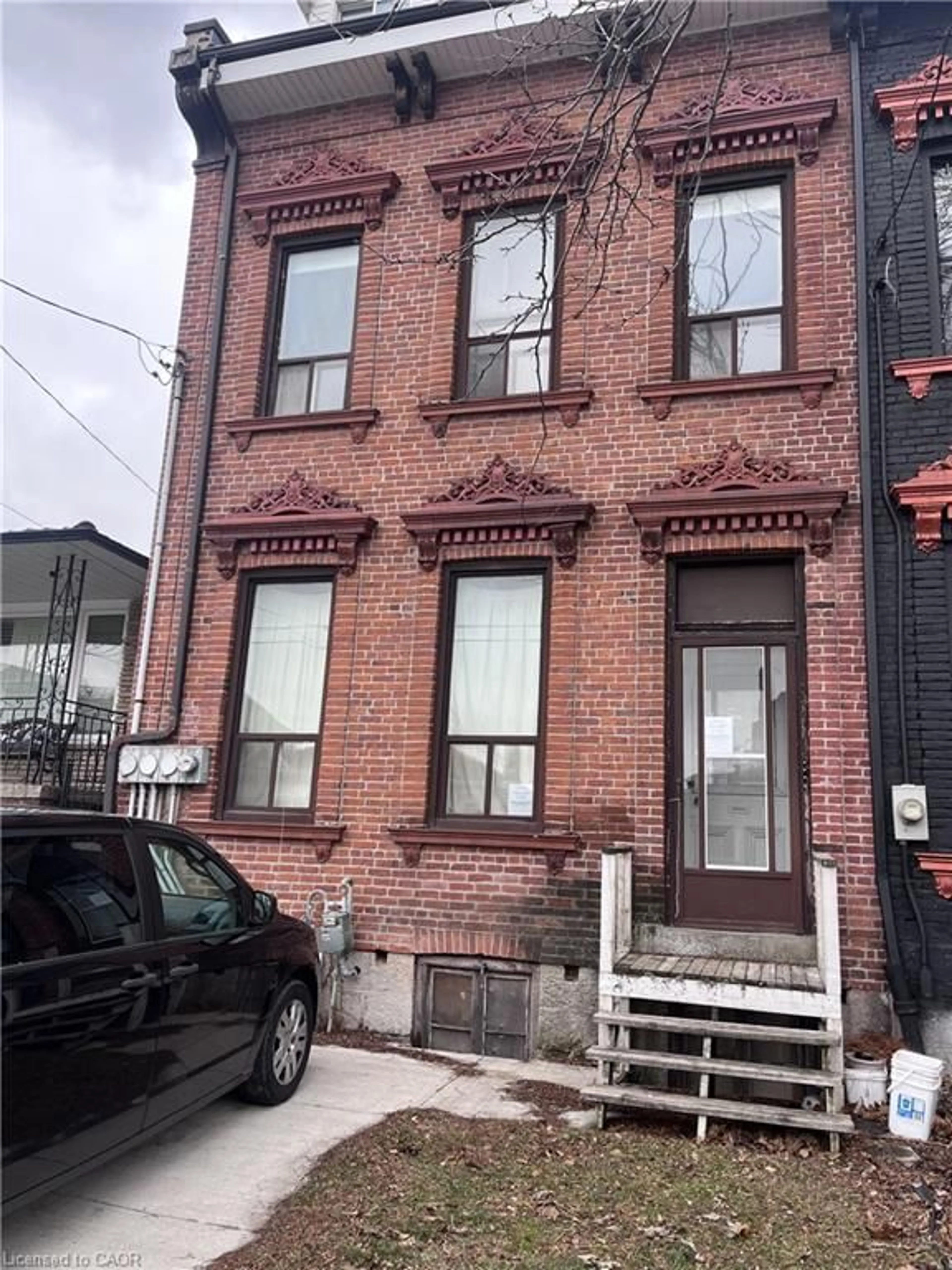 Home with brick exterior material, street for 223 Park St, Hamilton Ontario L8R 2N9