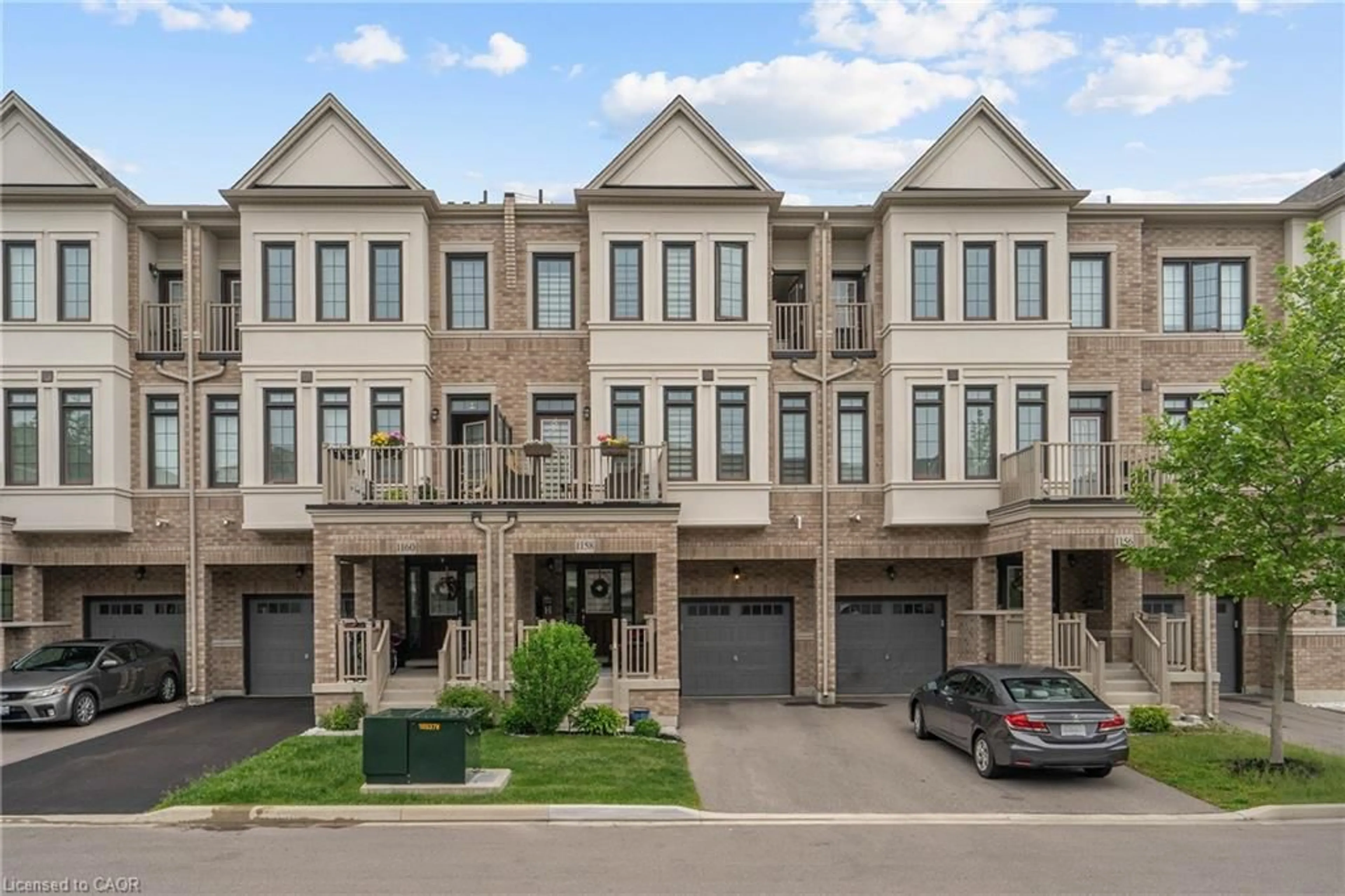 A pic from outside/outdoor area/front of a property/back of a property/a pic from drone, street for 1158 Restivo Lane, Milton Ontario L9E 1K1