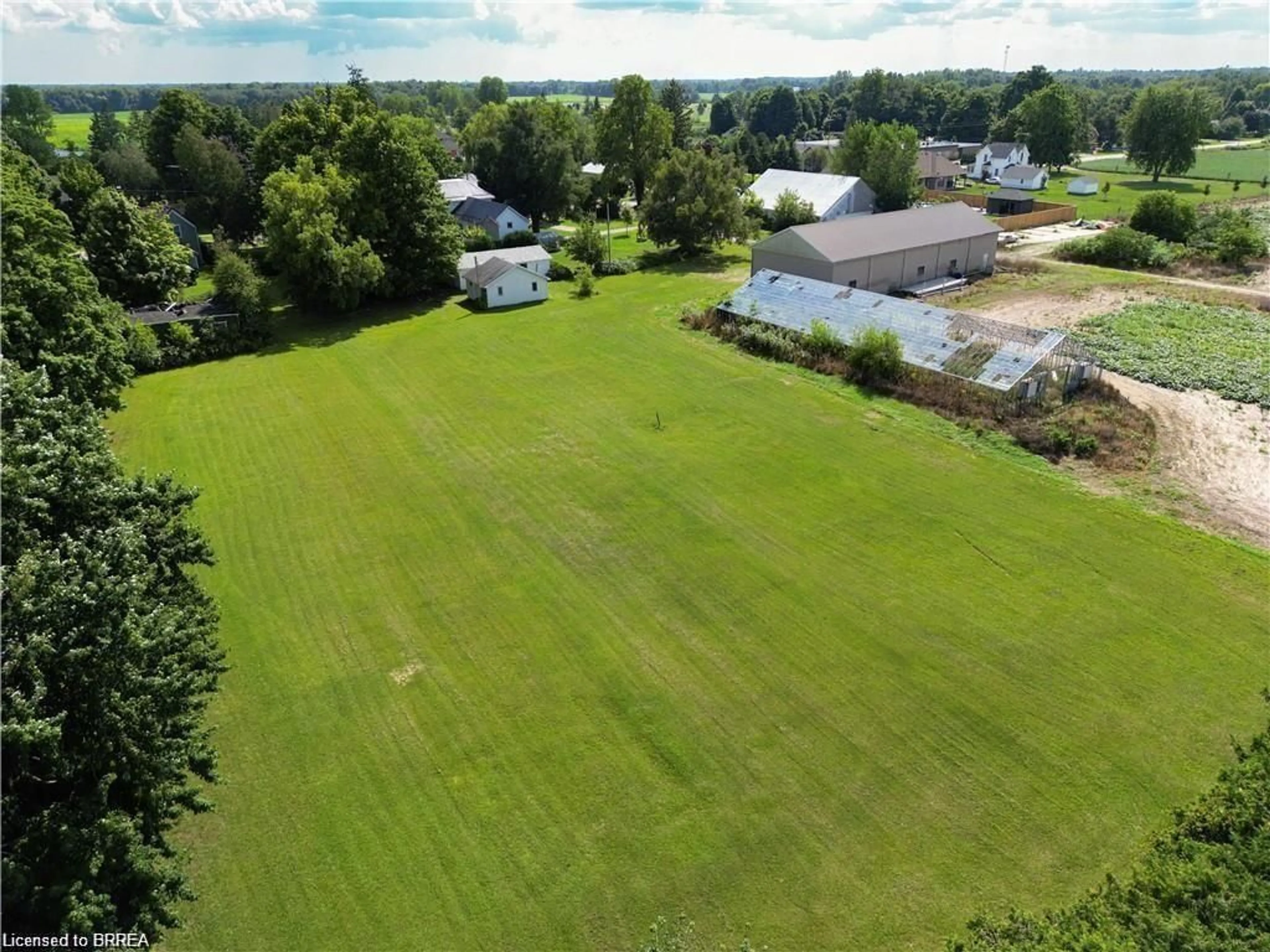A pic from outside/outdoor area/front of a property/back of a property/a pic from drone, unknown for 1009 Windham Centre Rd, Windham Centre Ontario N0E 2A0