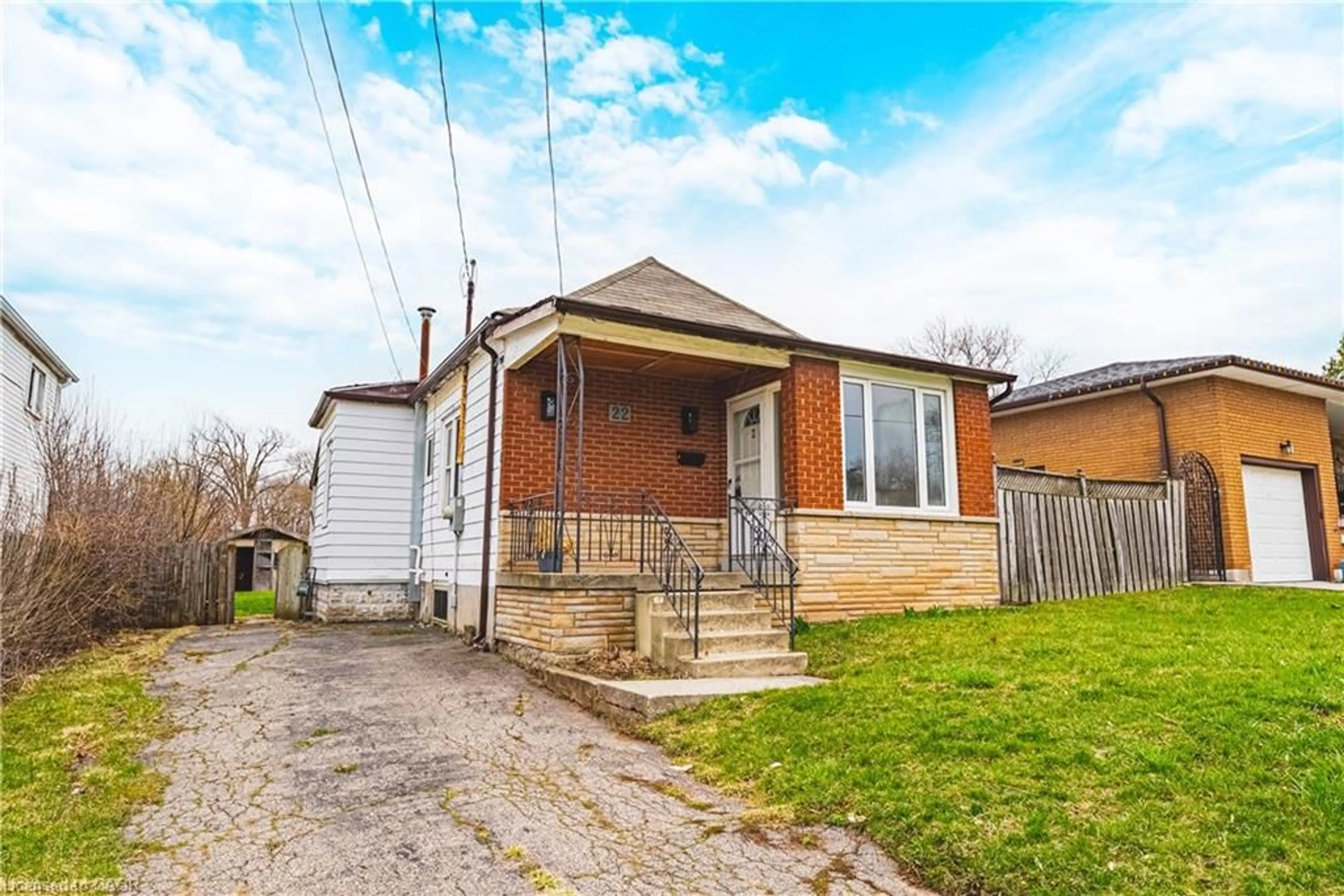 Home with brick exterior material, street for 22 Worsley Rd, Stoney Creek Ontario L8E 2E7