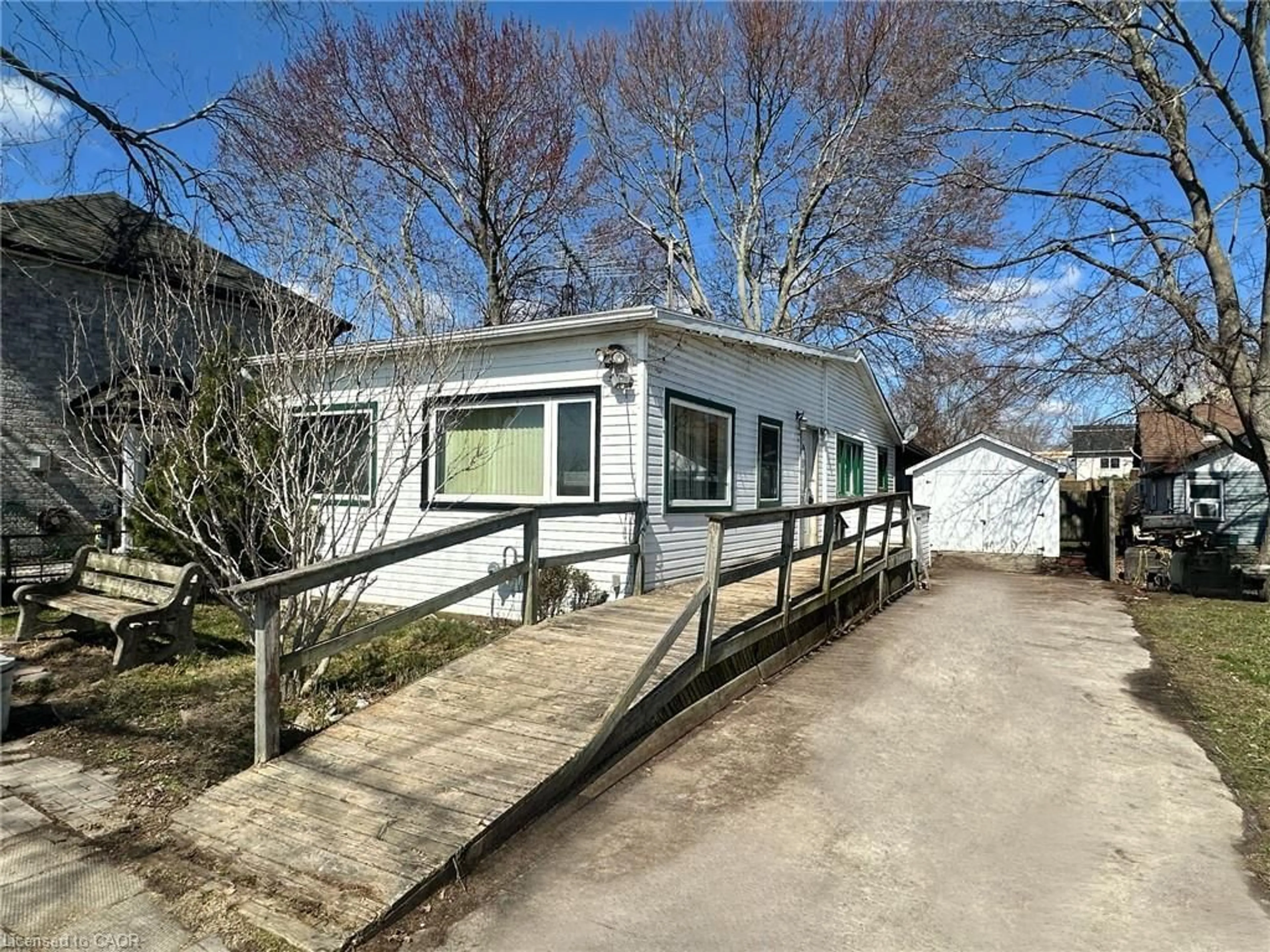 A pic from outside/outdoor area/front of a property/back of a property/a pic from drone, street for 2483 North Shore Dr, Lowbanks Ontario N0A 1K0