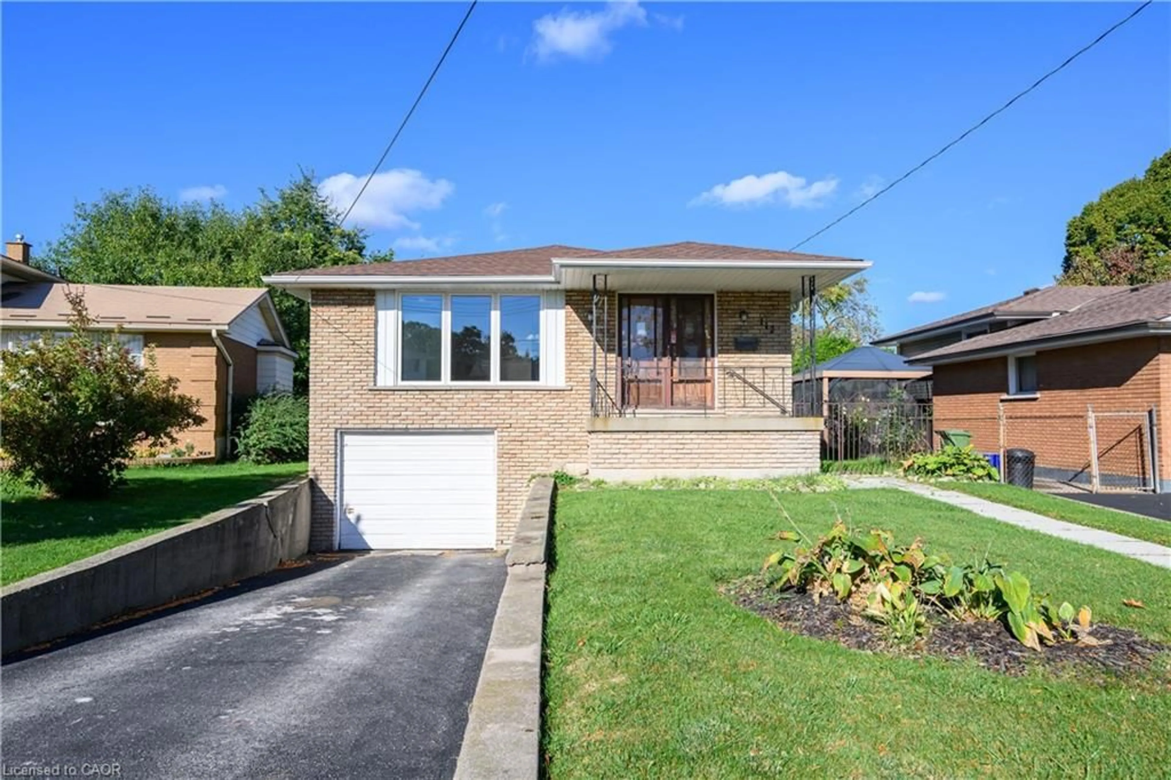 Home with brick exterior material, street for 112 Purdy Cres, Hamilton Ontario L9A 3B3