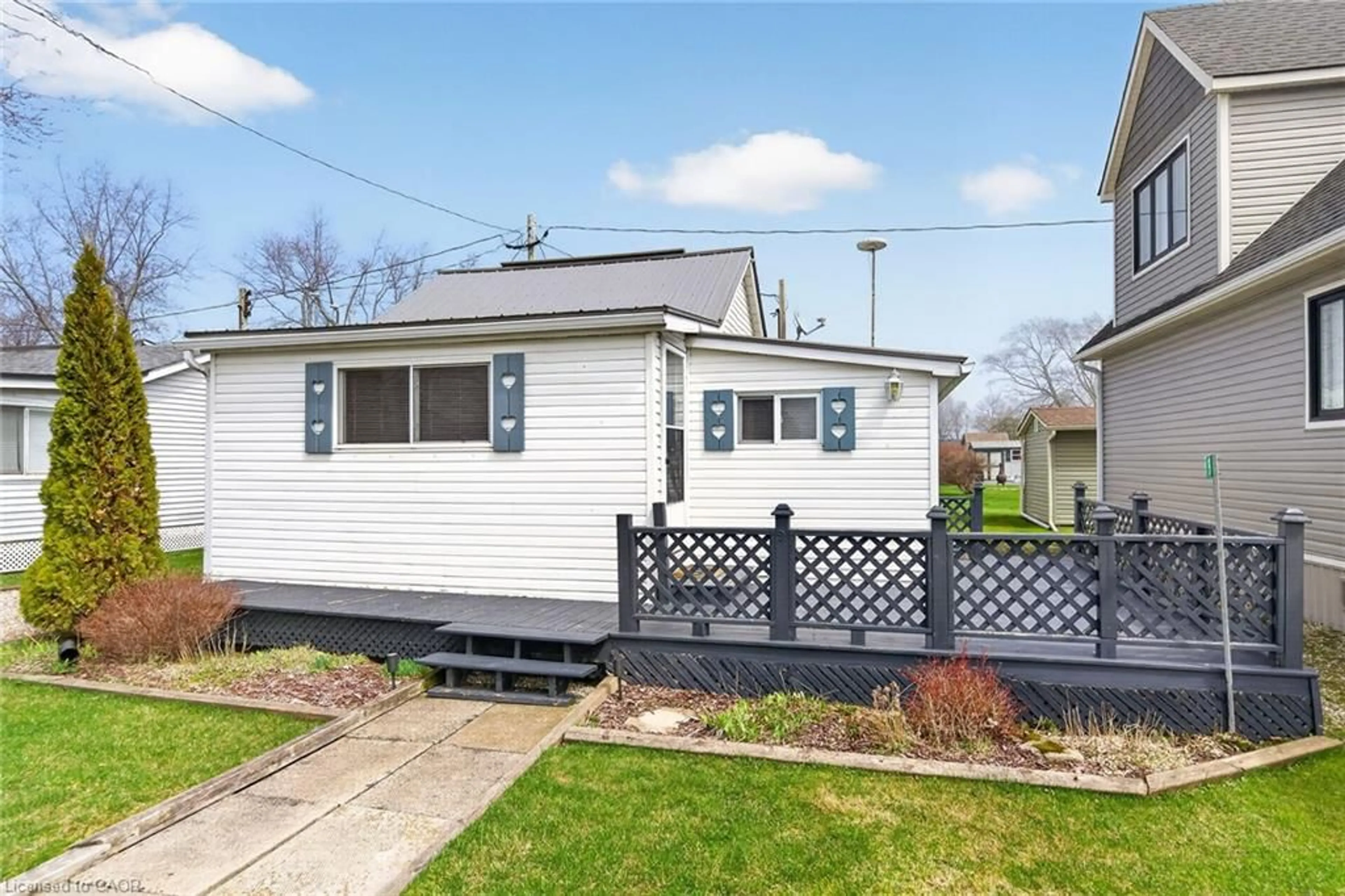 Home with vinyl exterior material, street for 9 Pike Lane, Featherstone Point Ontario N0A 1P0