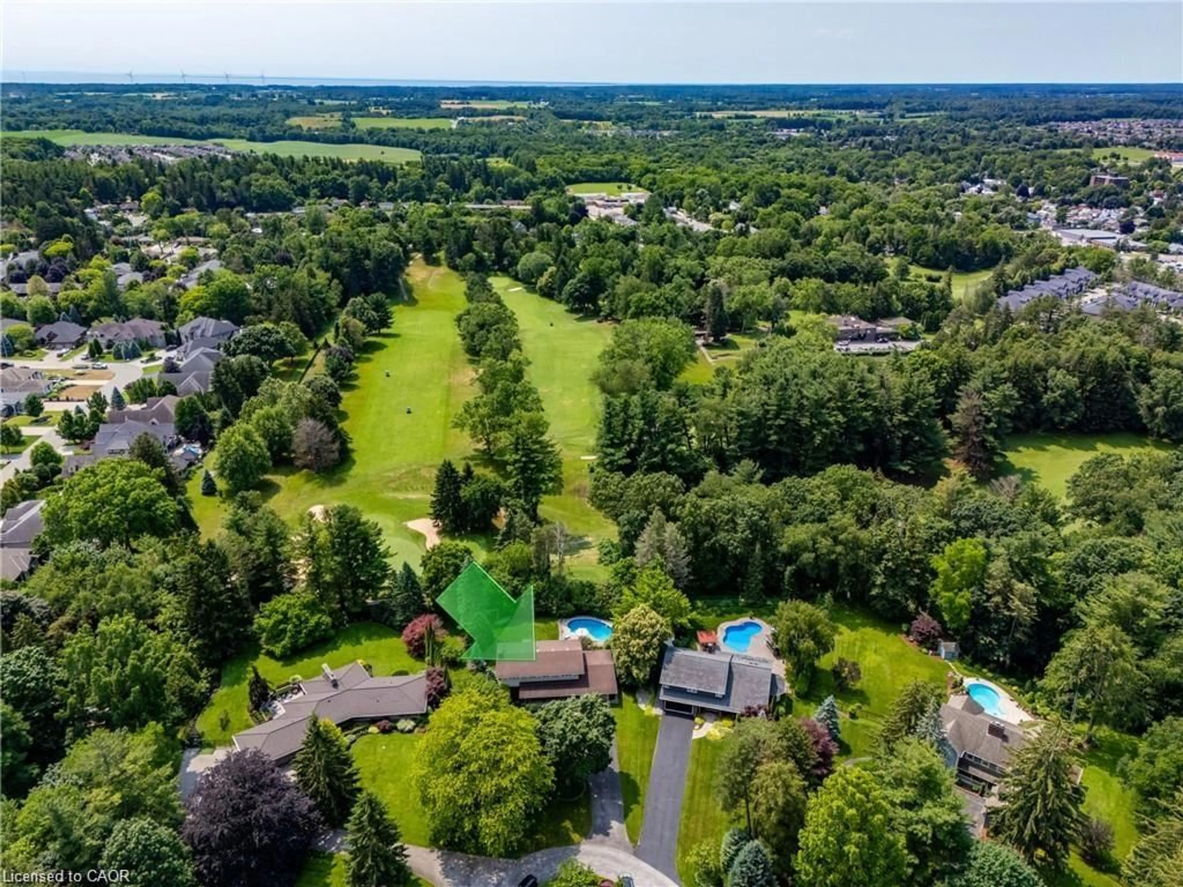 A pic from outside/outdoor area/front of a property/back of a property/a pic from drone, forest/trees view for 6 Summit Cir, Simcoe Ontario N3Y 3K8