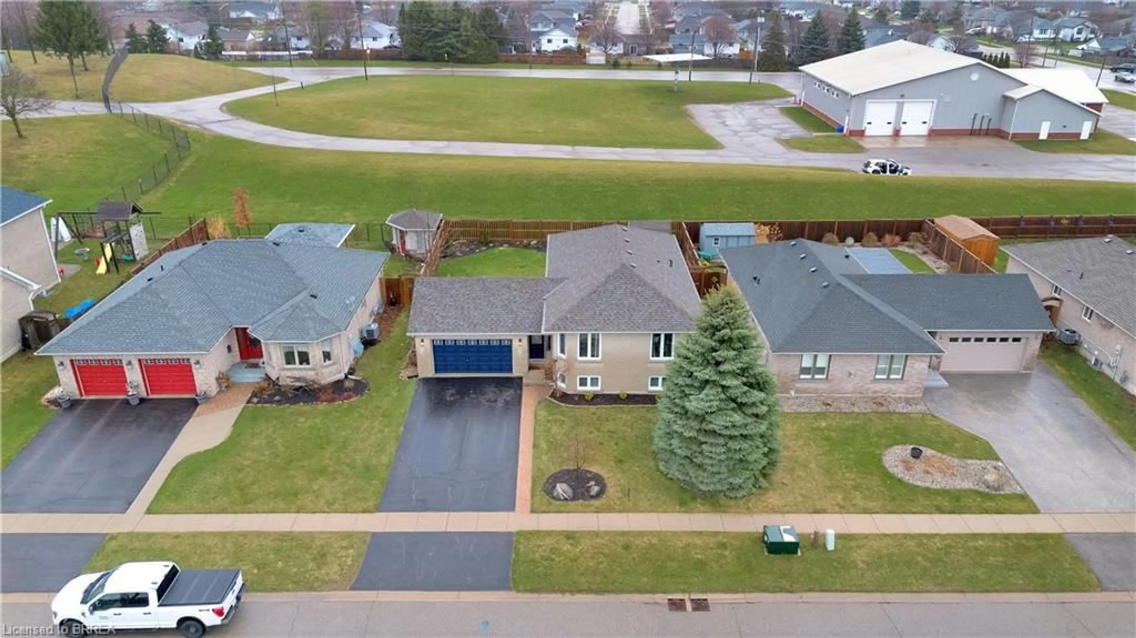 A pic from outside/outdoor area/front of a property/back of a property/a pic from drone, street for 65 Sunnyside Dr, St. George Ontario N0E 1N0