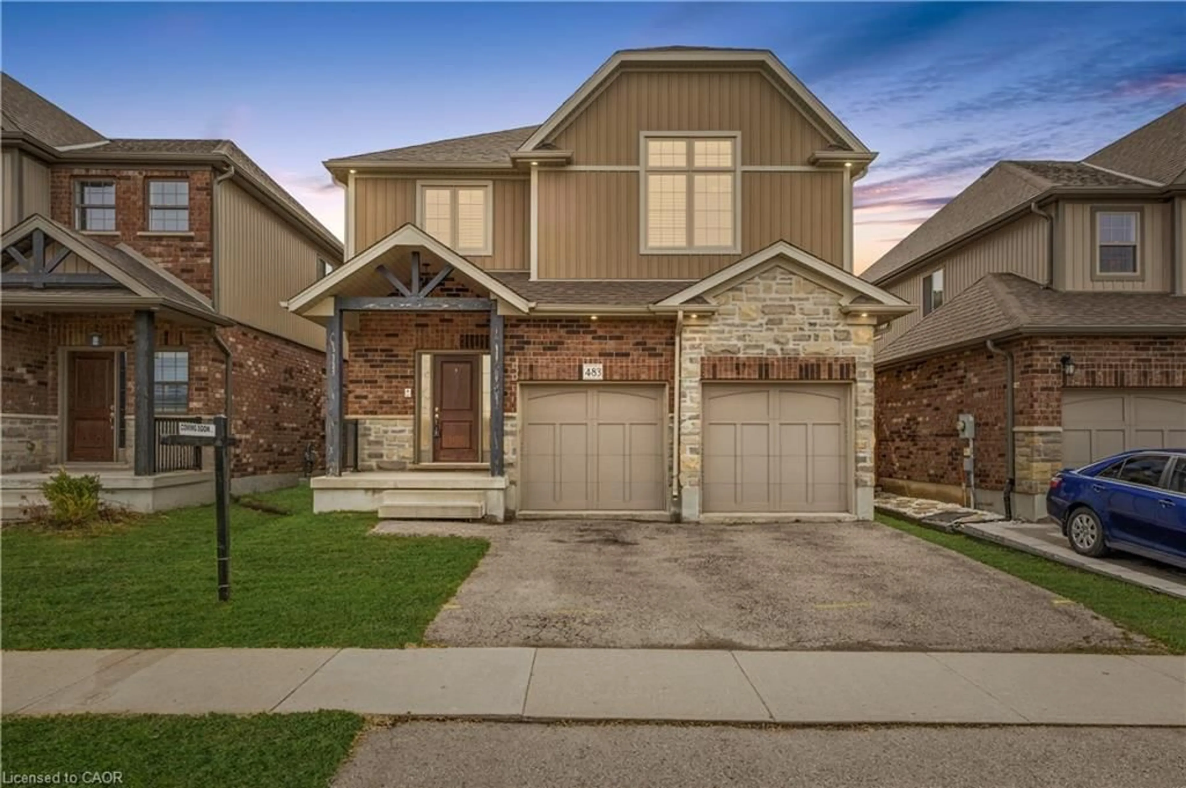 Home with brick exterior material, street for 483 St Moritz Ave, Waterloo Ontario N2T 0B3