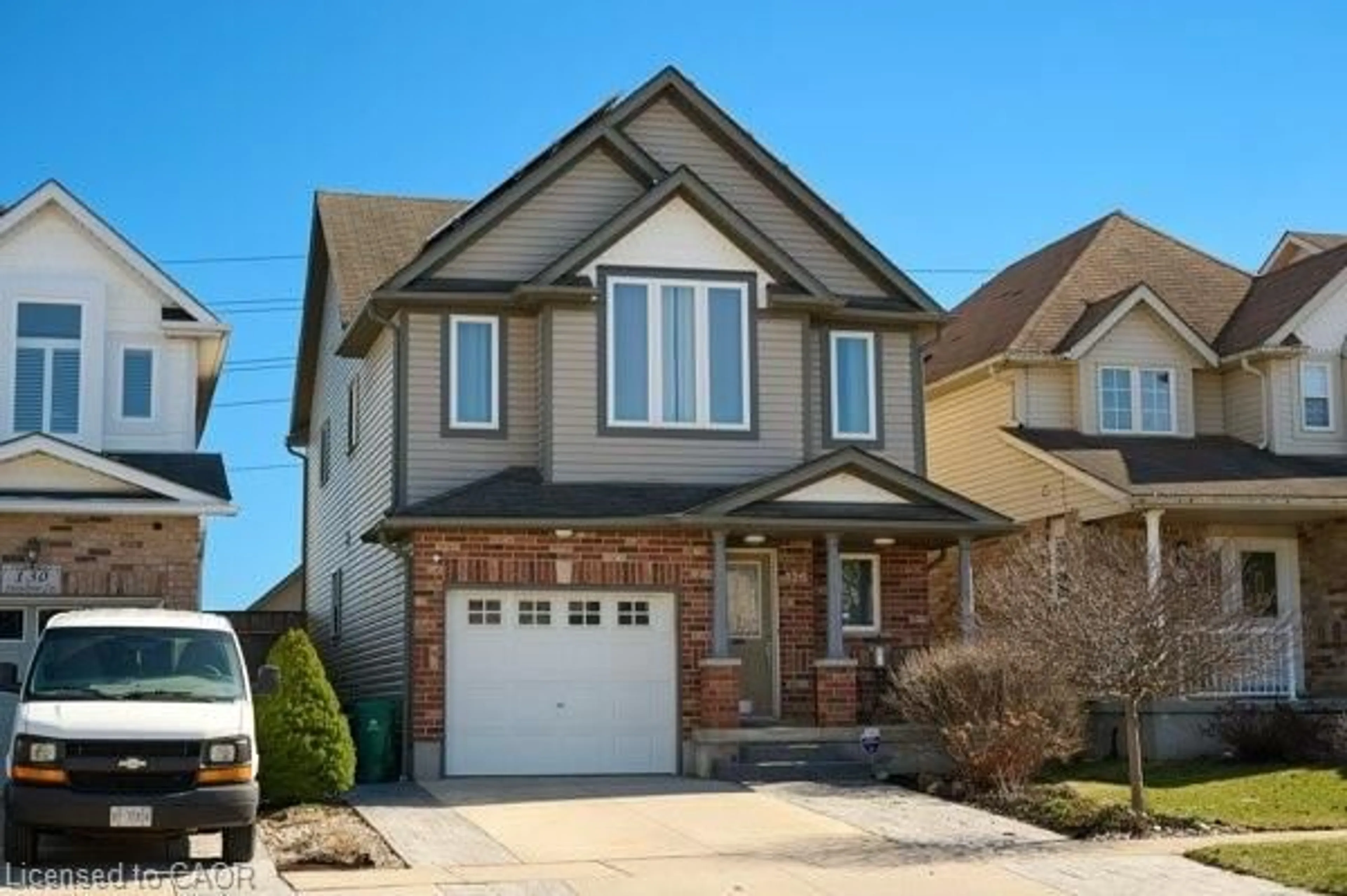 Home with brick exterior material, street for 126 Snowdrop Cres, Kitchener Ontario N2E 4G7