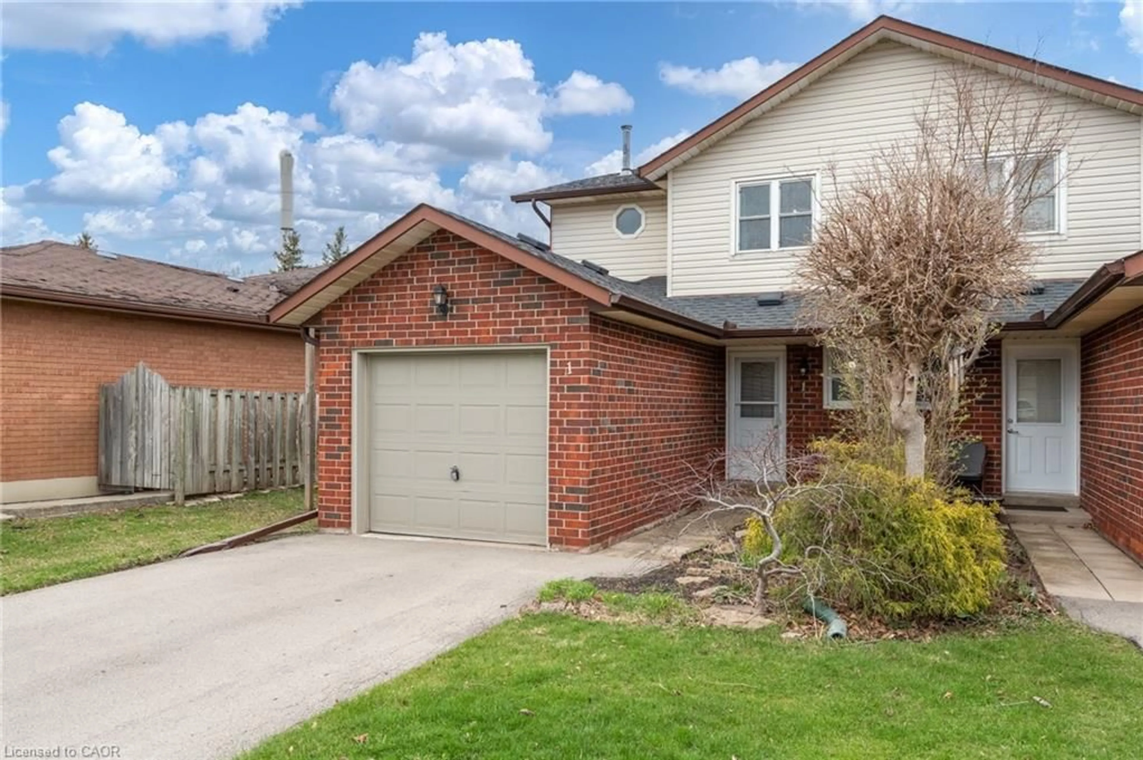 Home with brick exterior material, street for 23 Dynasty Ave #1, Stoney Creek Ontario L8G 4Z5