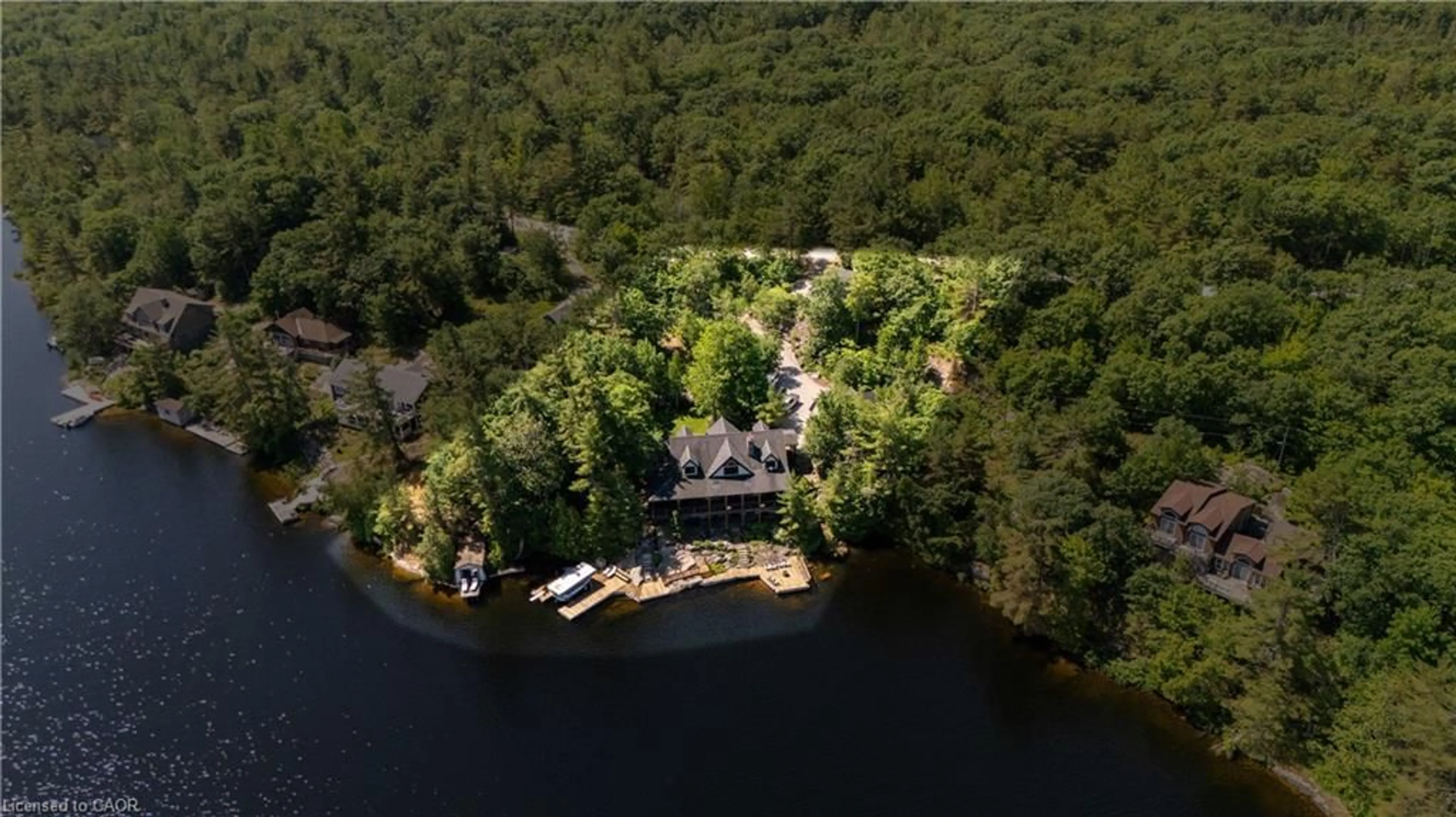 A pic from outside/outdoor area/front of a property/back of a property/a pic from drone, water/lake/river/ocean view for 990 Haskett's Dr, Port Severn Ontario L0K 1S0