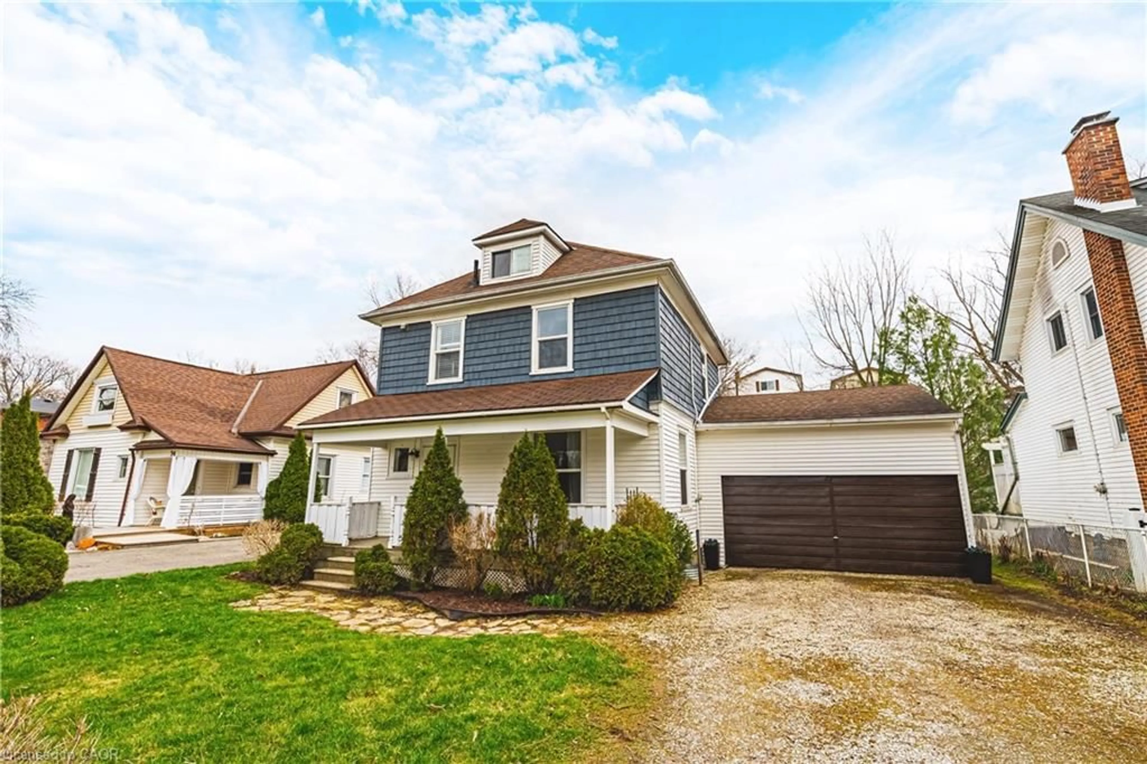 Home with vinyl exterior material, street for 30 Grand Ave, Caledonia Ontario N3W 2J5