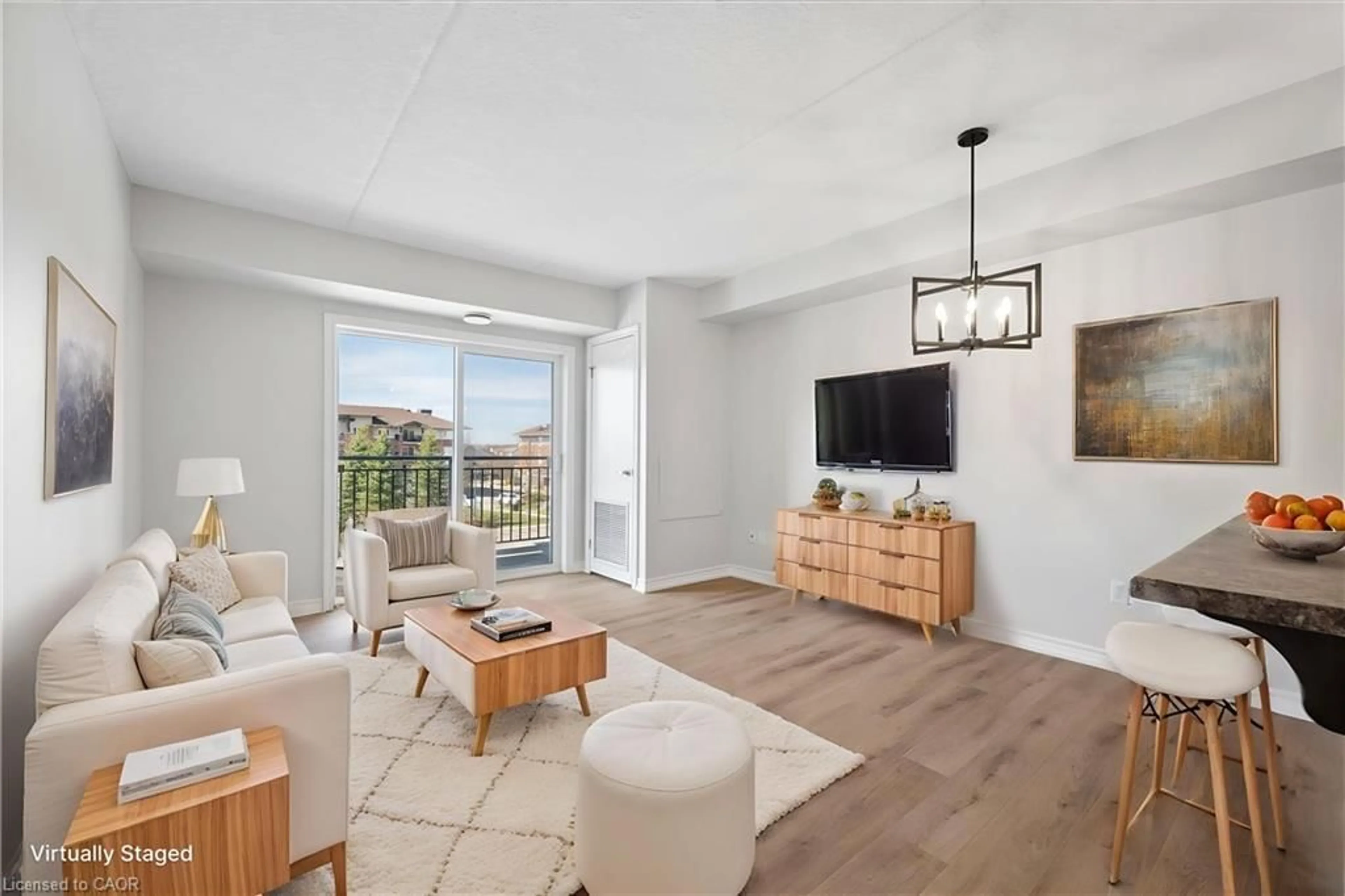 Living room with furniture, unknown for 43 Goodwin Dr #302C, Guelph Ontario N1L 0E8