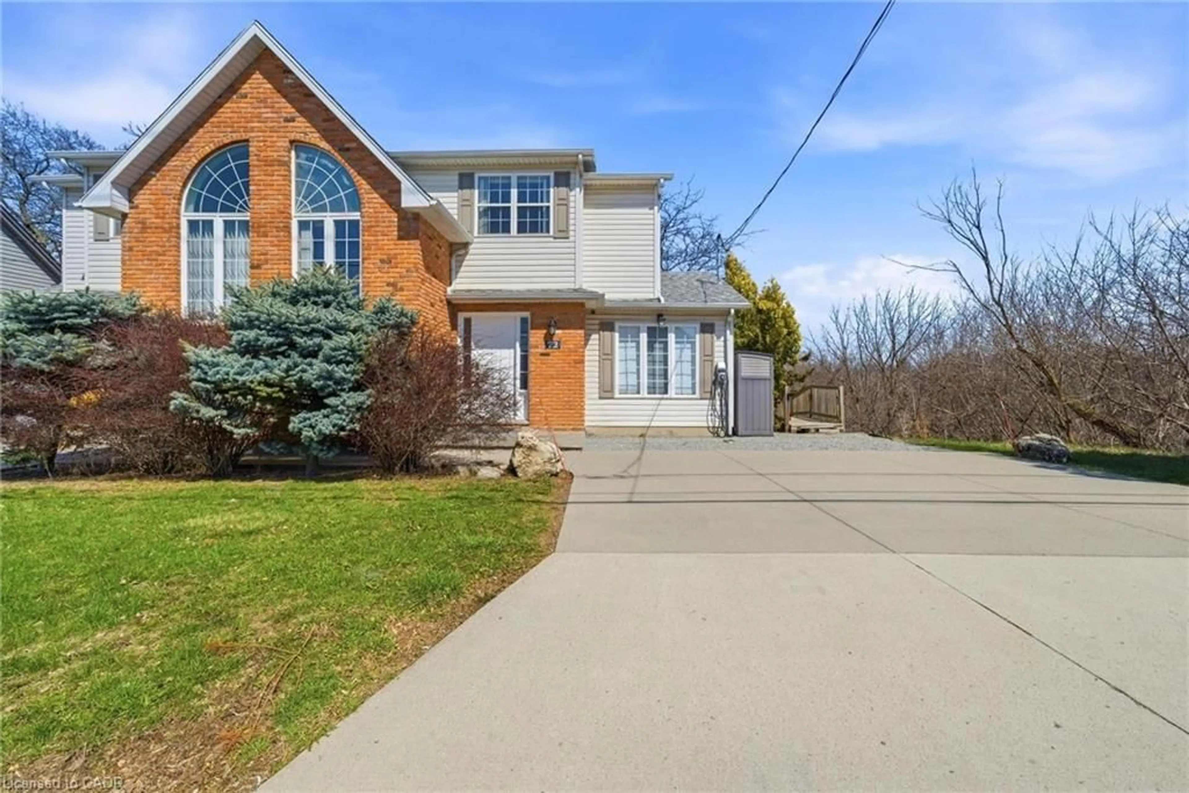 Home with brick exterior material, street for 72 Martindale Rd, St. Catharines Ontario L2S 2Y3
