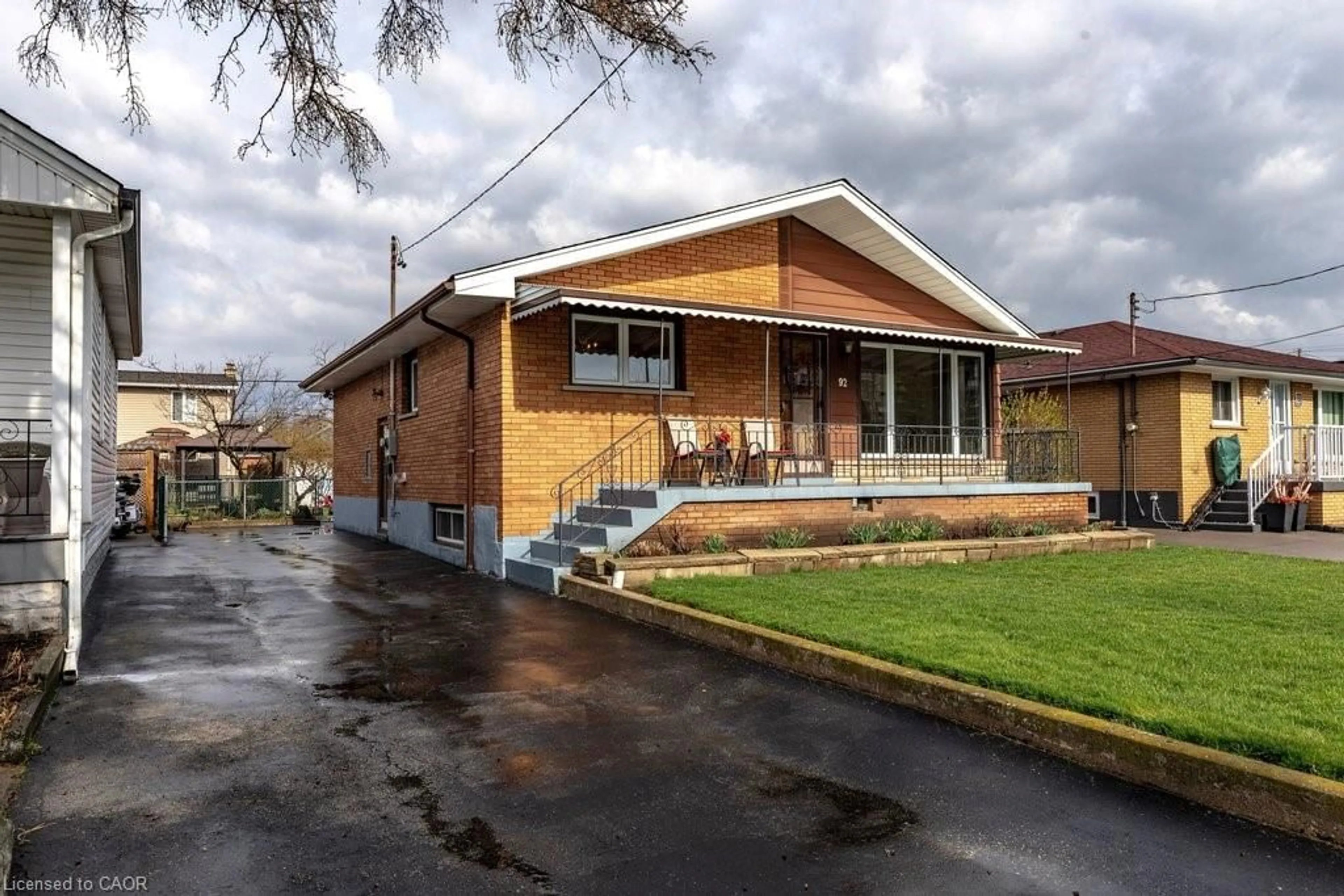 Home with brick exterior material, street for 92 Reid Ave, Hamilton Ontario L8K 3V1
