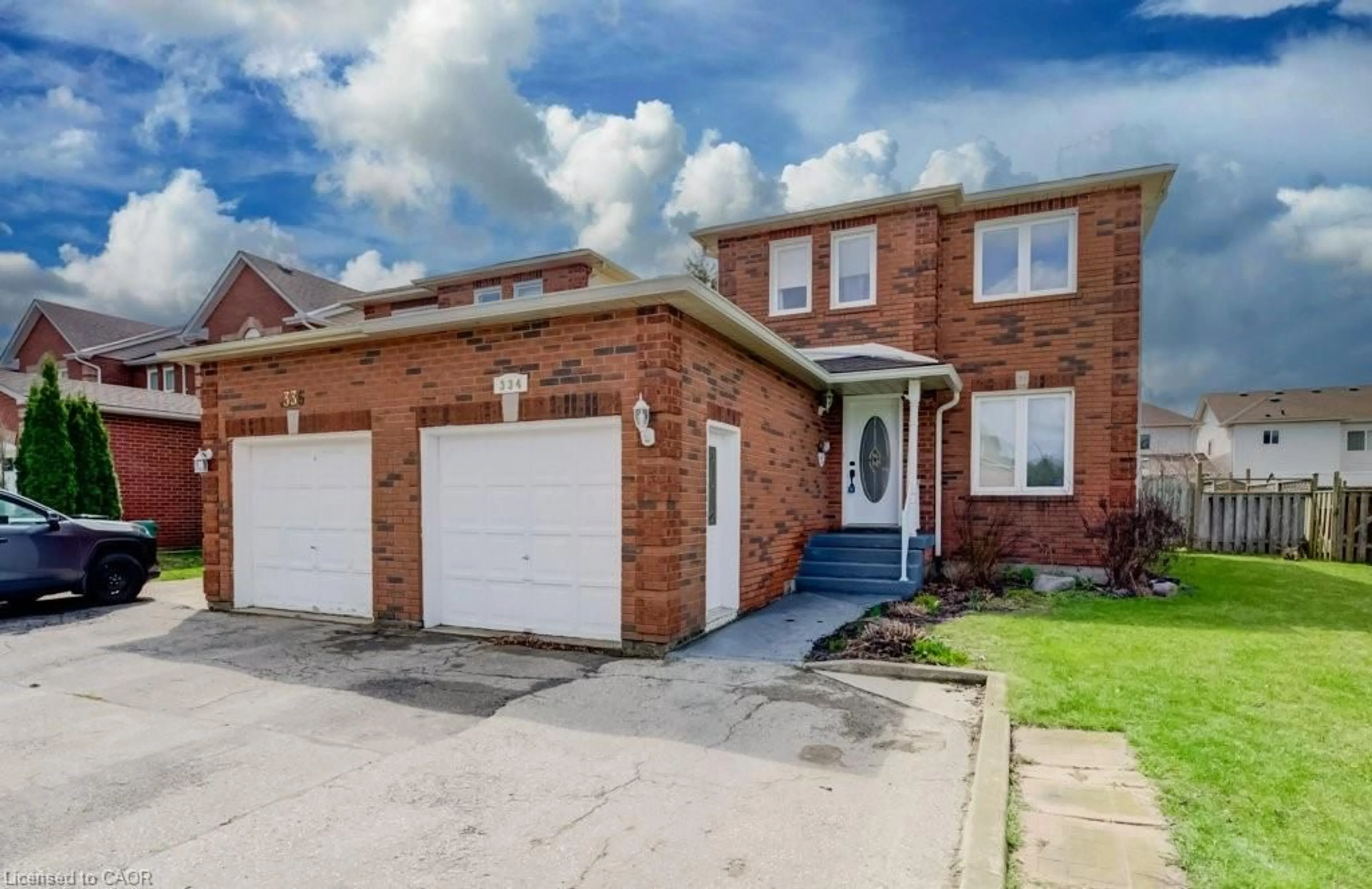 Home with brick exterior material, street for 334 Christopher Dr, Cambridge Ontario N1P 1B9