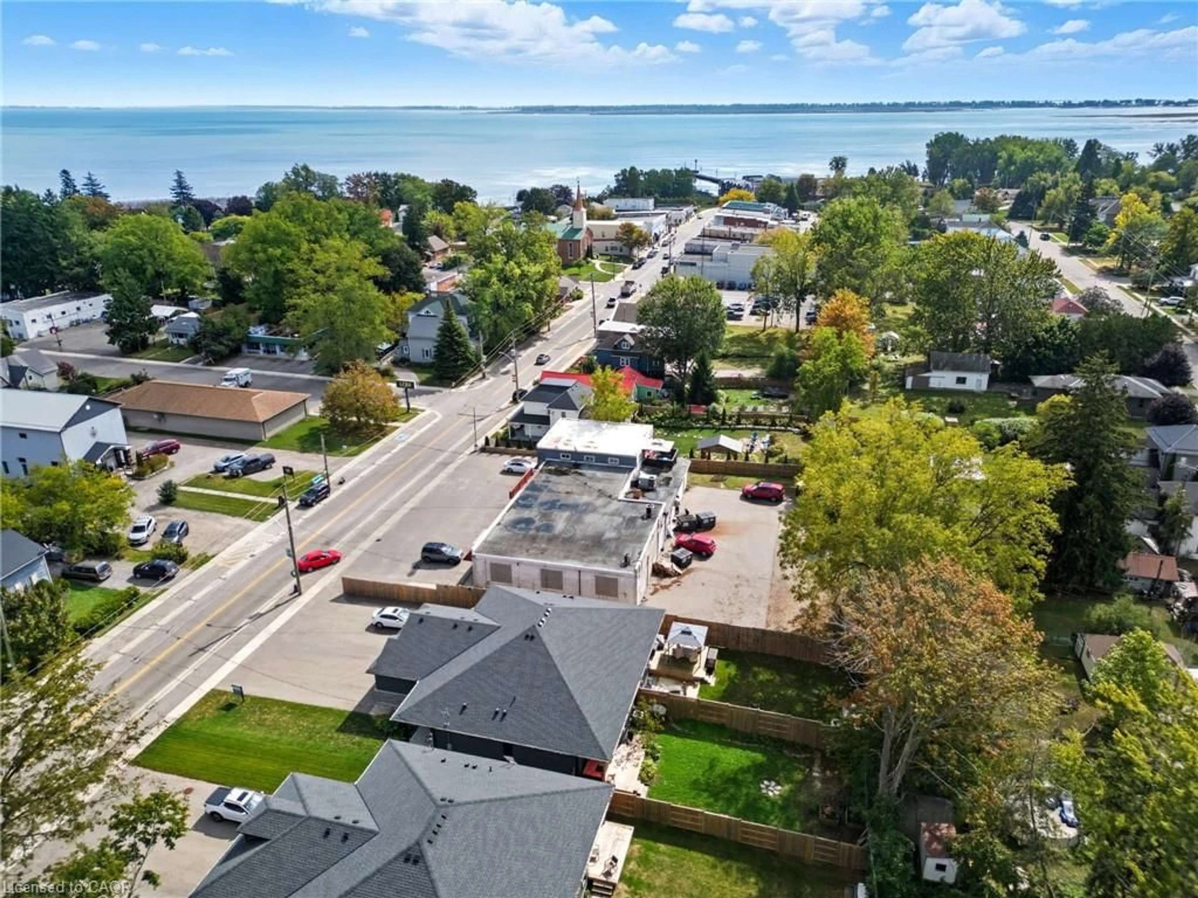 A pic from outside/outdoor area/front of a property/back of a property/a pic from drone, water/lake/river/ocean view for 1053 Bay St, Port Rowan Ontario N0E 1M0