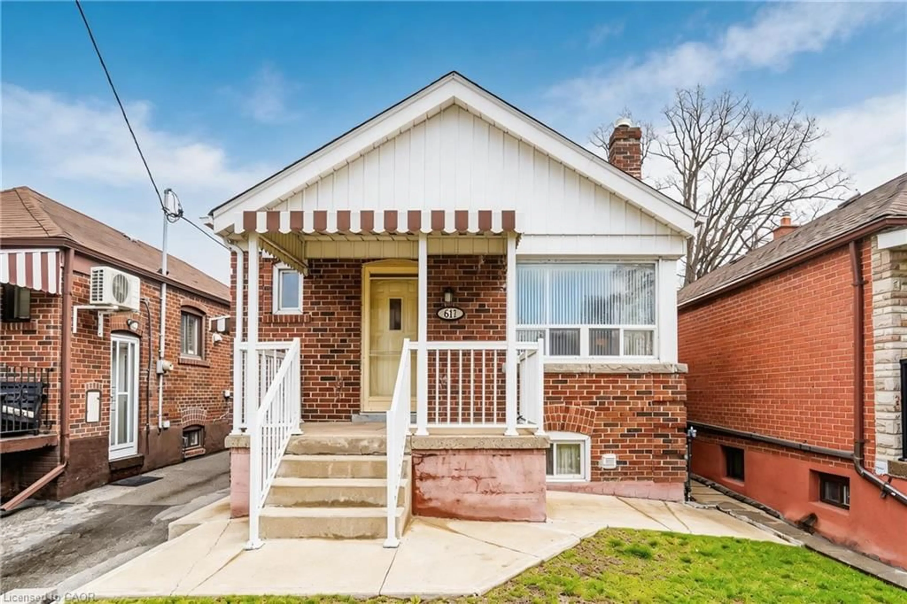 Home with brick exterior material, street for 617 Caledonia Rd, Toronto Ontario M6E 4V7