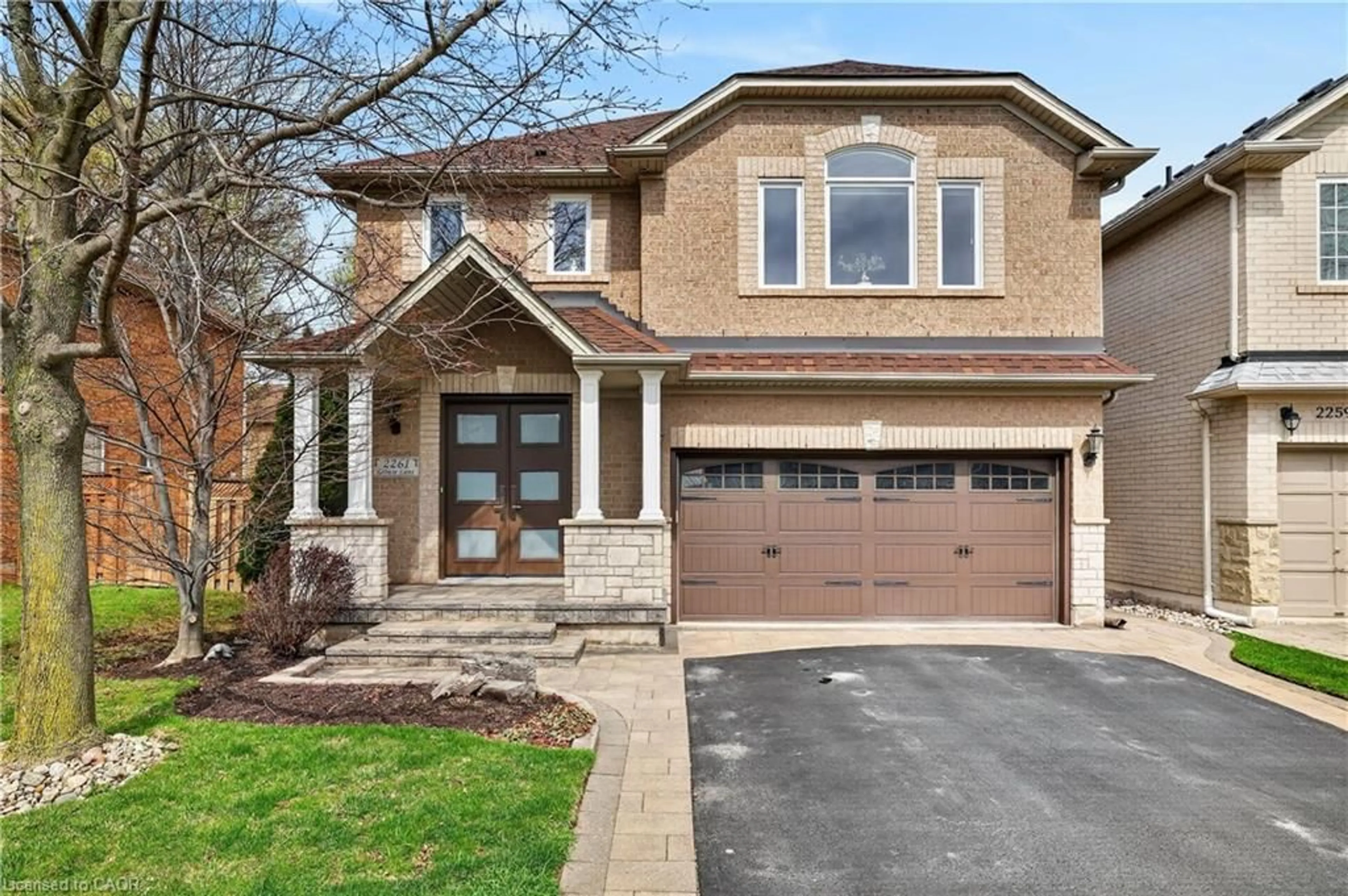 Home with brick exterior material, street for 2261 Grouse Lane, Oakville Ontario L6M 3Z8