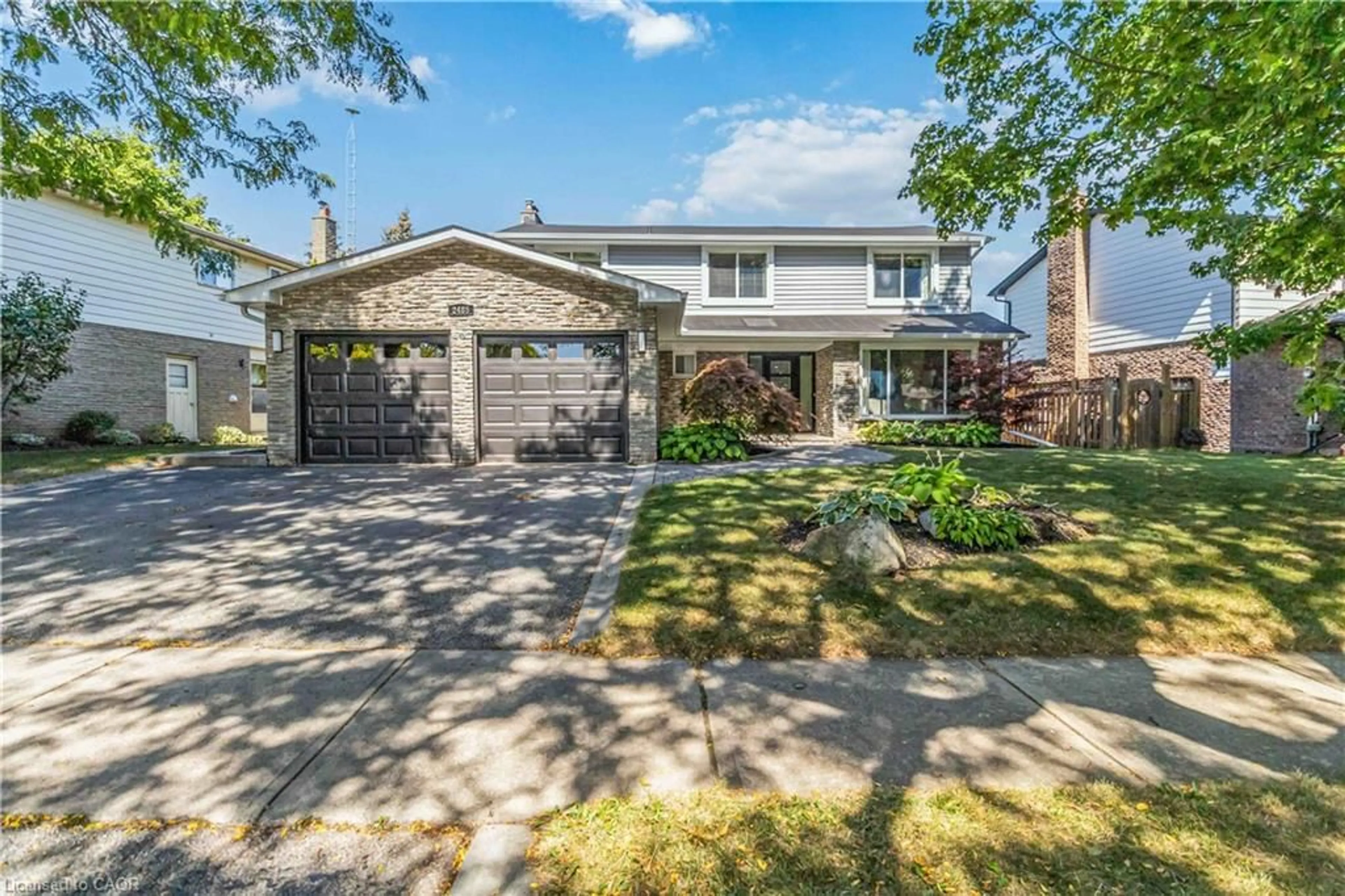 Home with brick exterior material, street for 2485 Woburn Cres, Oakville Ontario L6L 5E8