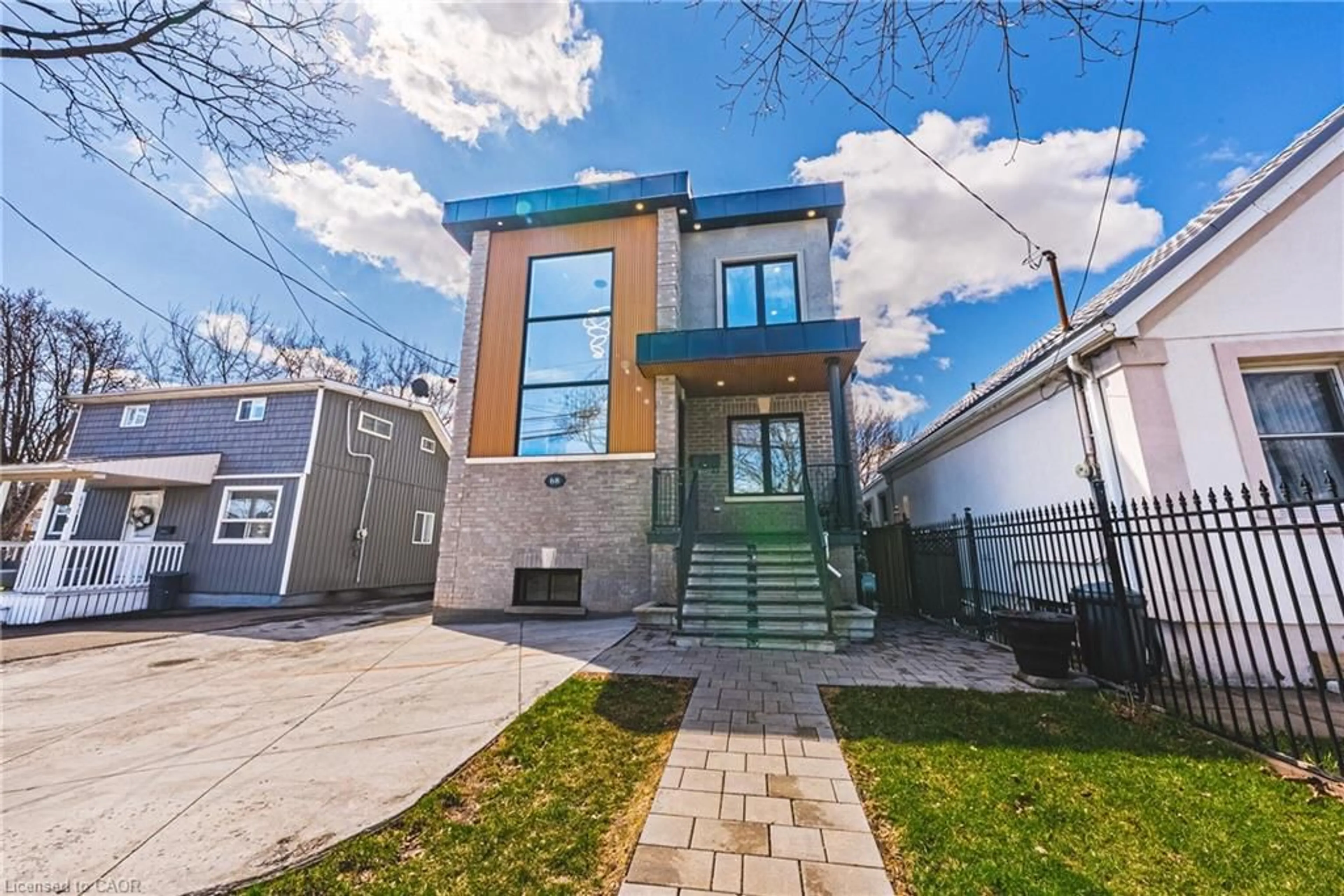 Home with brick exterior material, street for 68 Vansitmart Ave, Hamilton Ontario L8H 3A5