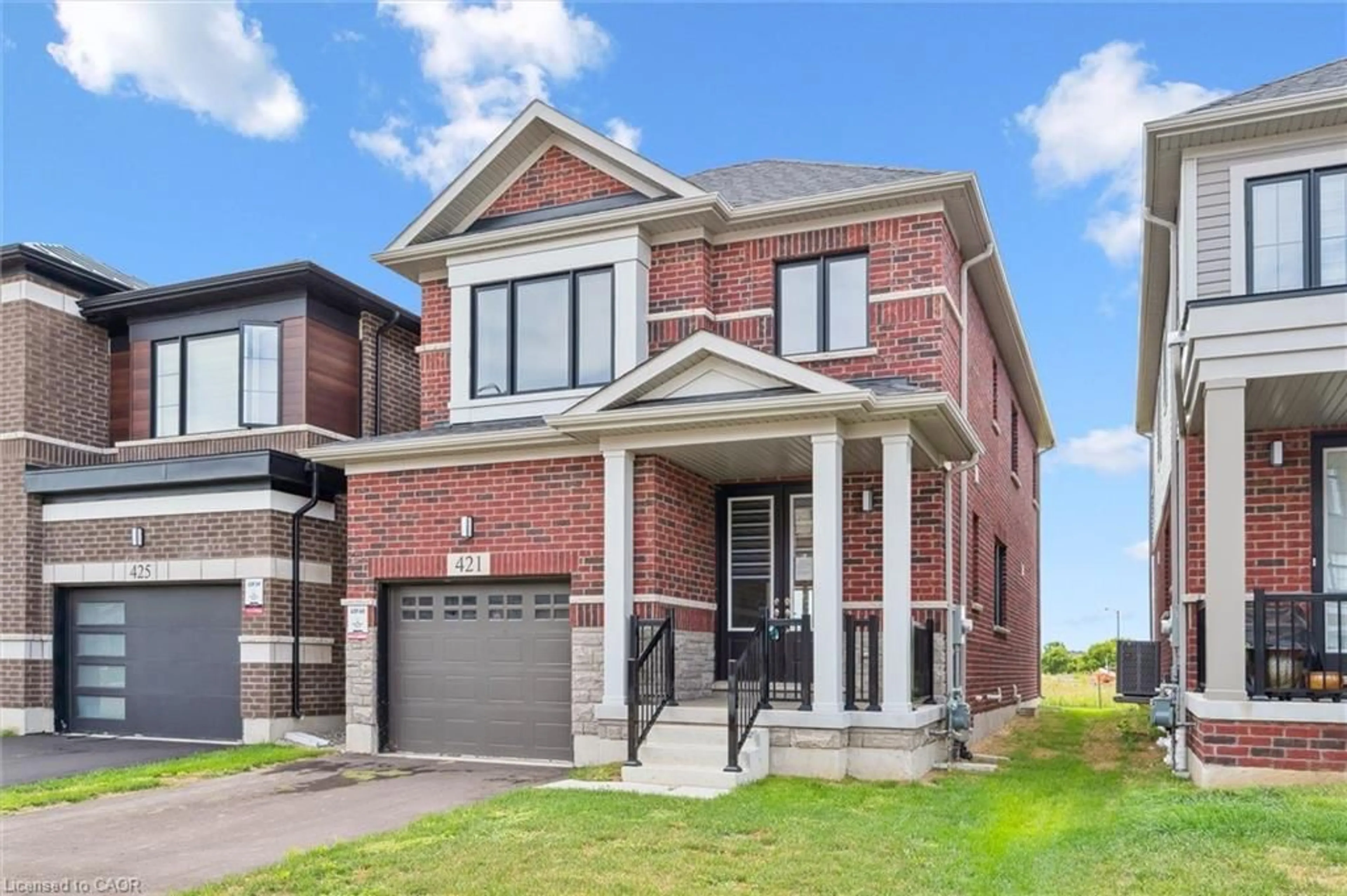 Home with brick exterior material, street for 421 Newman Dr, Cambridge Ontario N1S 0E1