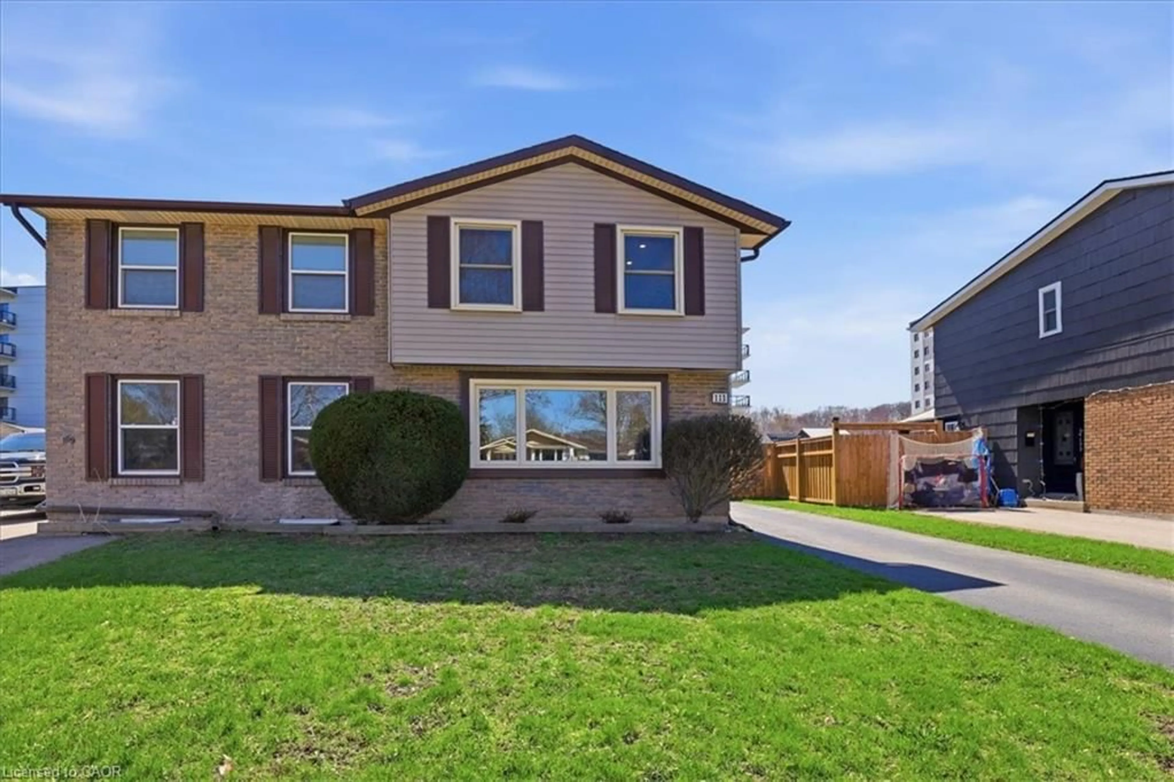 Home with vinyl exterior material, street for 111 Selkirk Dr, Kitchener Ontario N2E 1M5