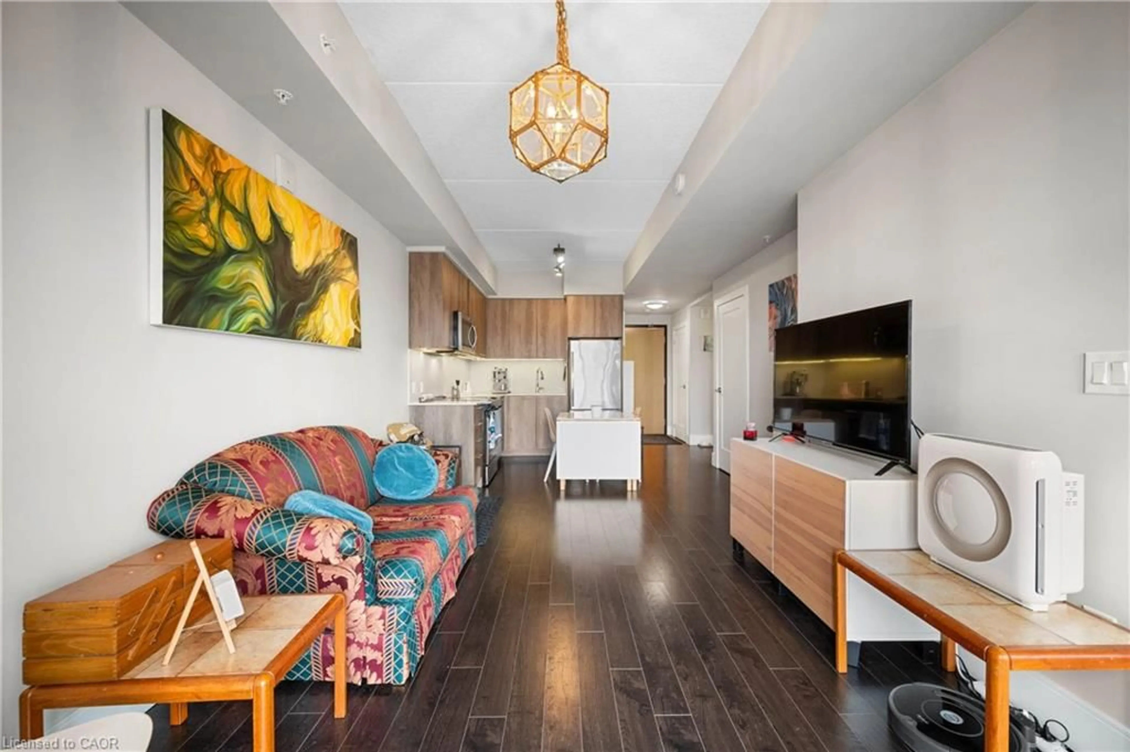 Living room with furniture, wood/laminate floor for 15 Prince Albert Blvd #507, Kitchener Ontario N2H 0C2