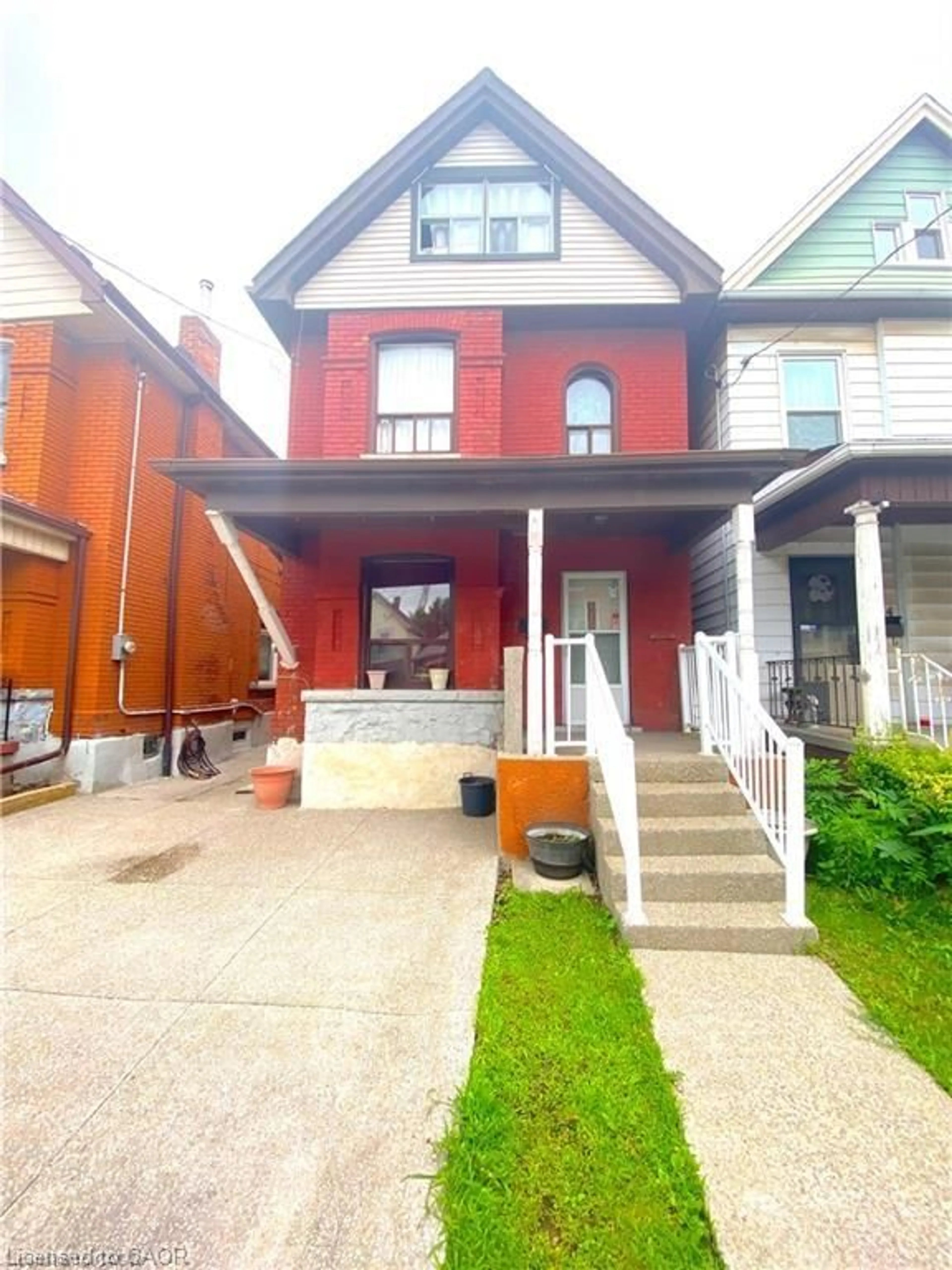 Home with brick exterior material, street for 126 Gibson Ave, Hamilton Ontario L8L 6J8