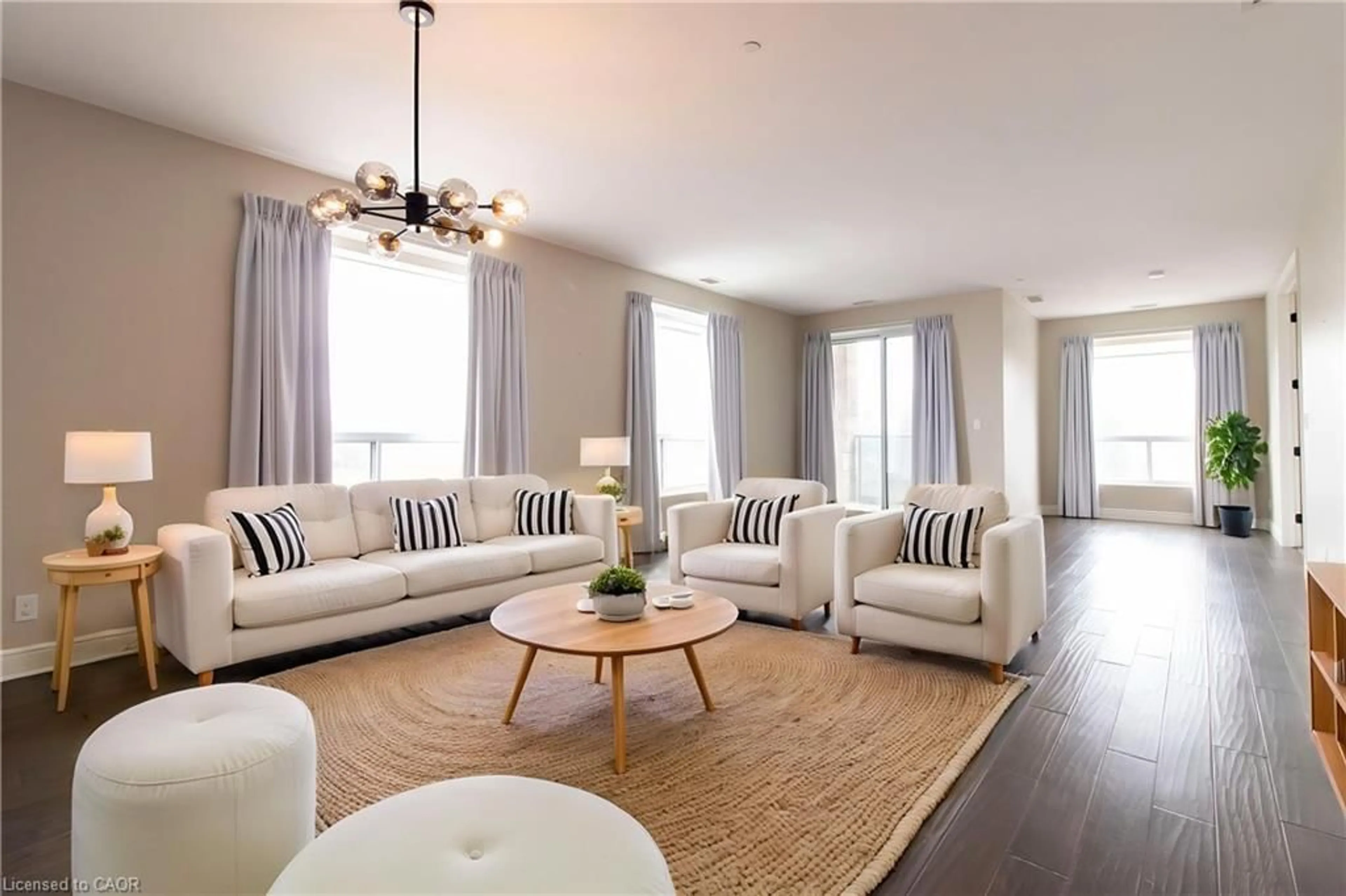 Living room with furniture, unknown for 223 Erb St #307, Waterloo Ontario N2L 0B3