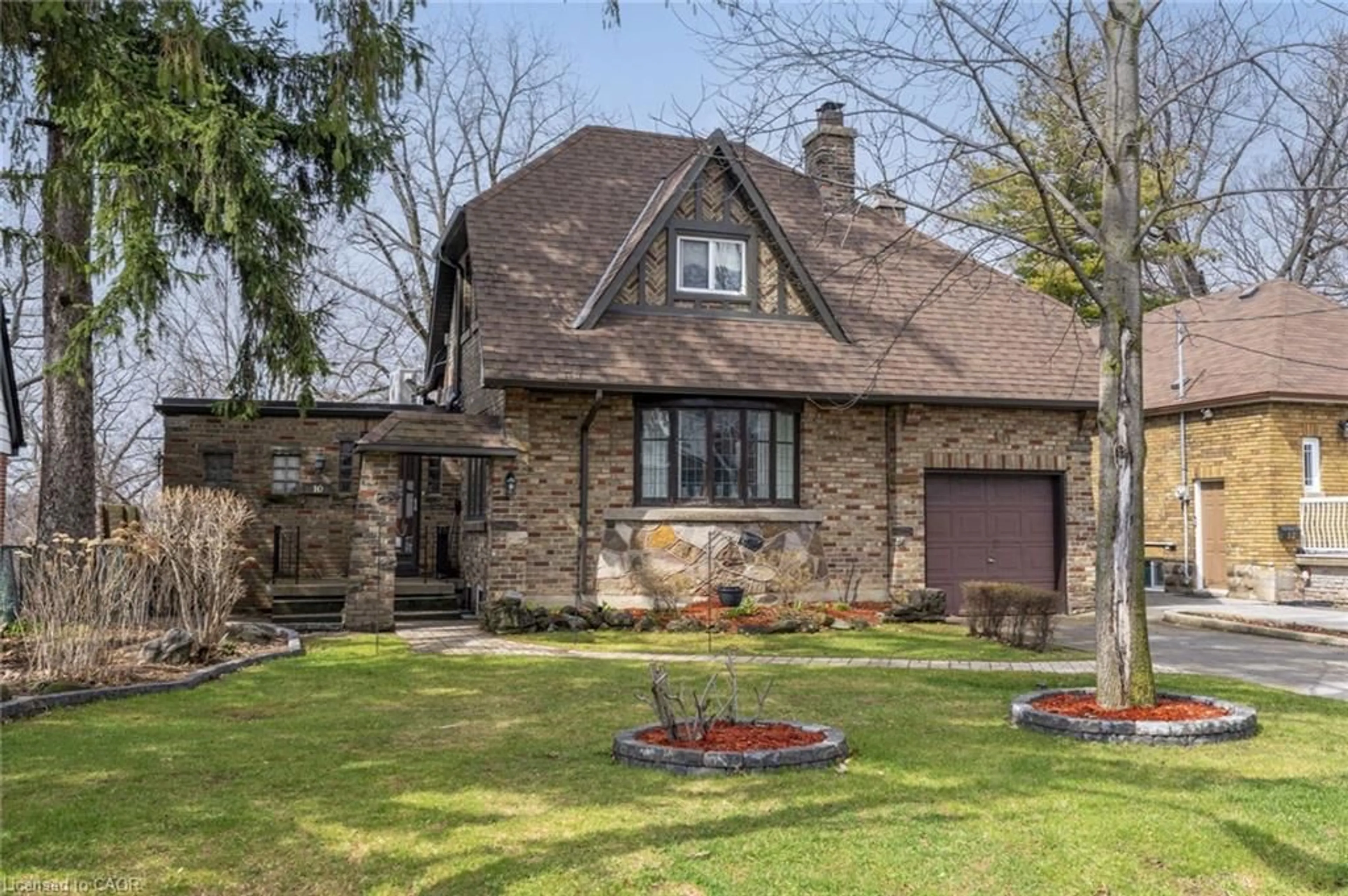 Home with brick exterior material, street for 10 Landour Ave, York Ontario M6M 4J4