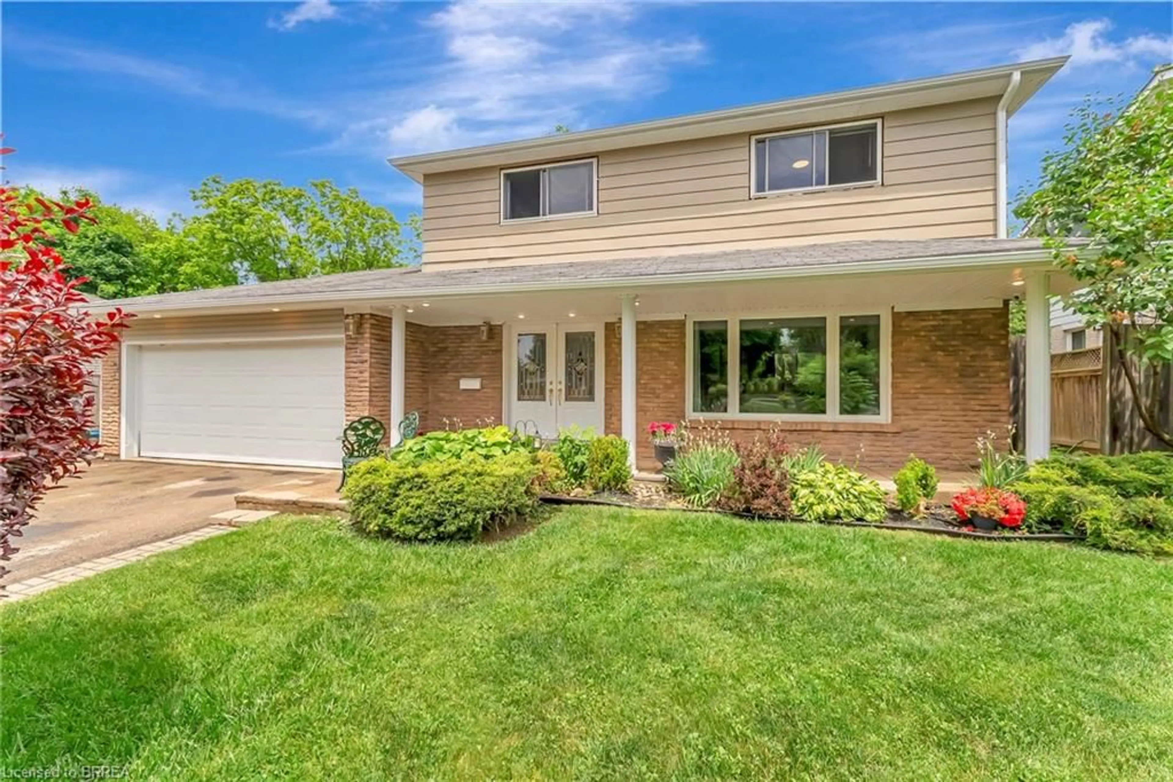 Home with brick exterior material, street for 307 Erindale Dr, Burlington Ontario L7L 4T3